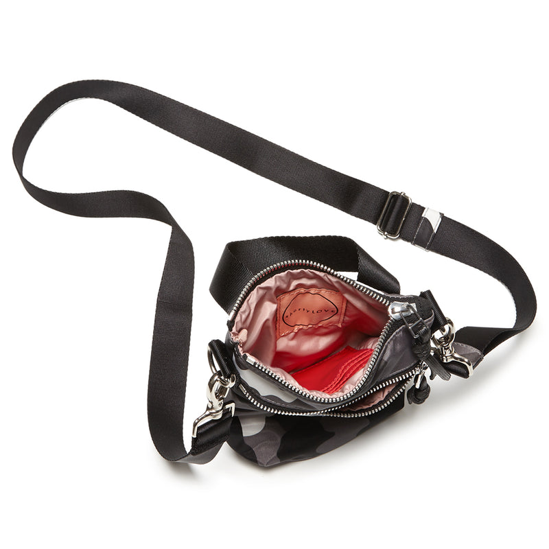 shortyLOVE shorthand small crossbody bag in grey camo; top-down view showing interior blush lining against white background.