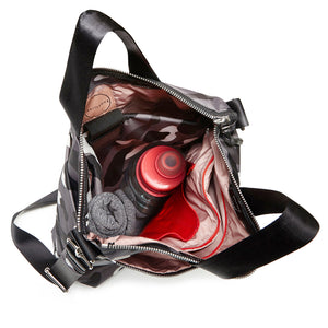 shortyLOVE wonder large crossbody/messenger bag in grey camo; top-down view showing interior blush lining against white background.