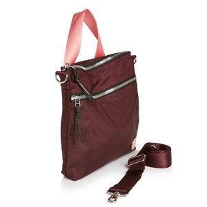 shortyLOVE arcade belt bag in burgundy; side angle view against white background.