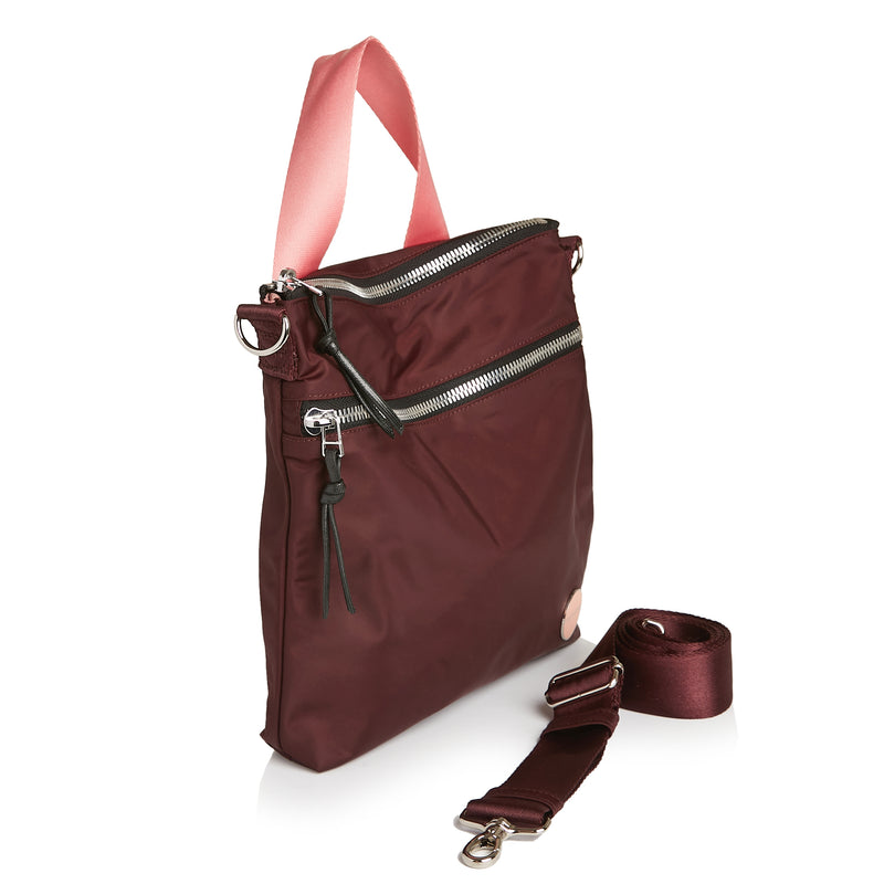 shortyLOVE arcade belt bag in burgundy; side angle view against white background.