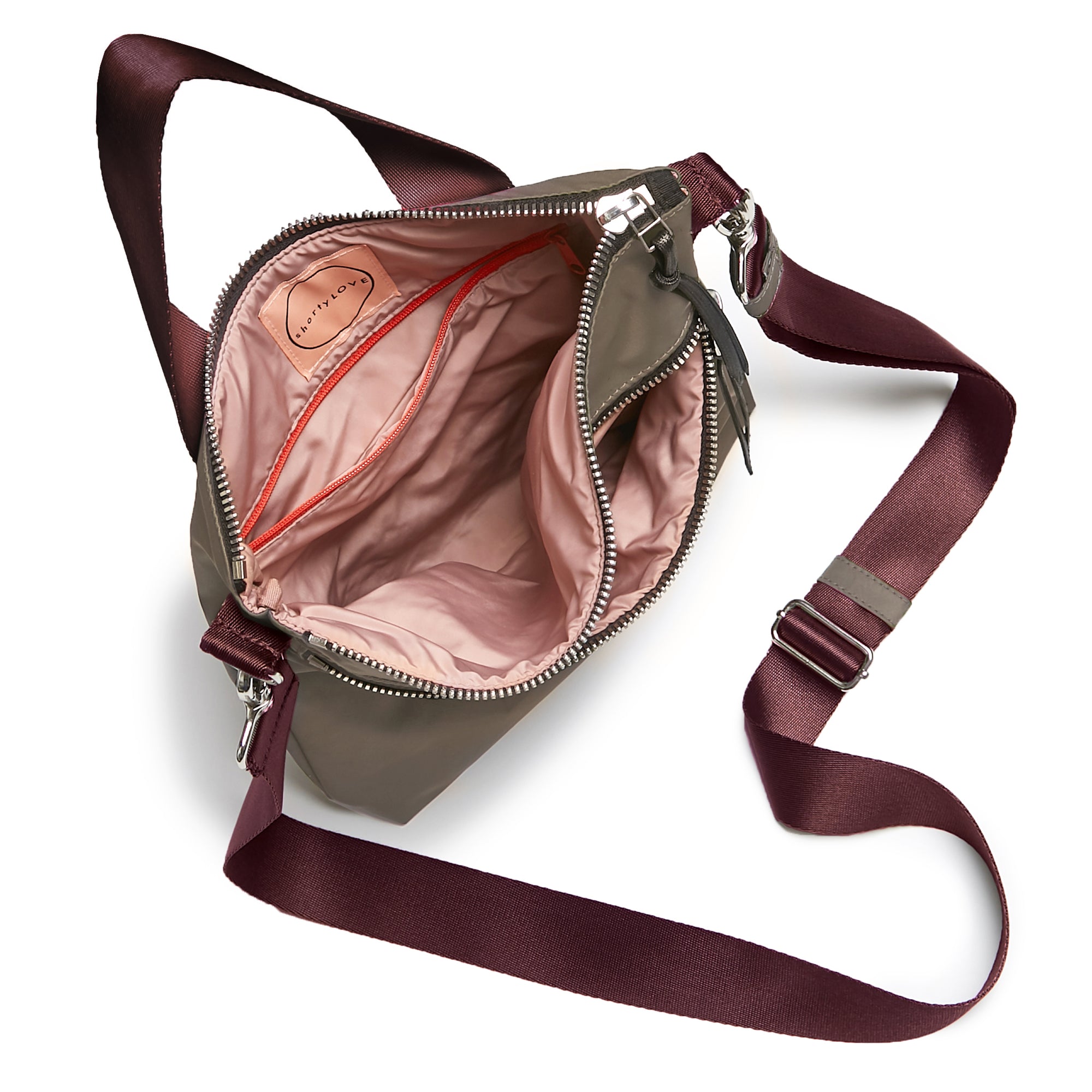 shortyLOVE amuse medium sized crossbody bag in mocha; top-down view showing interior mocha lining against white background.
