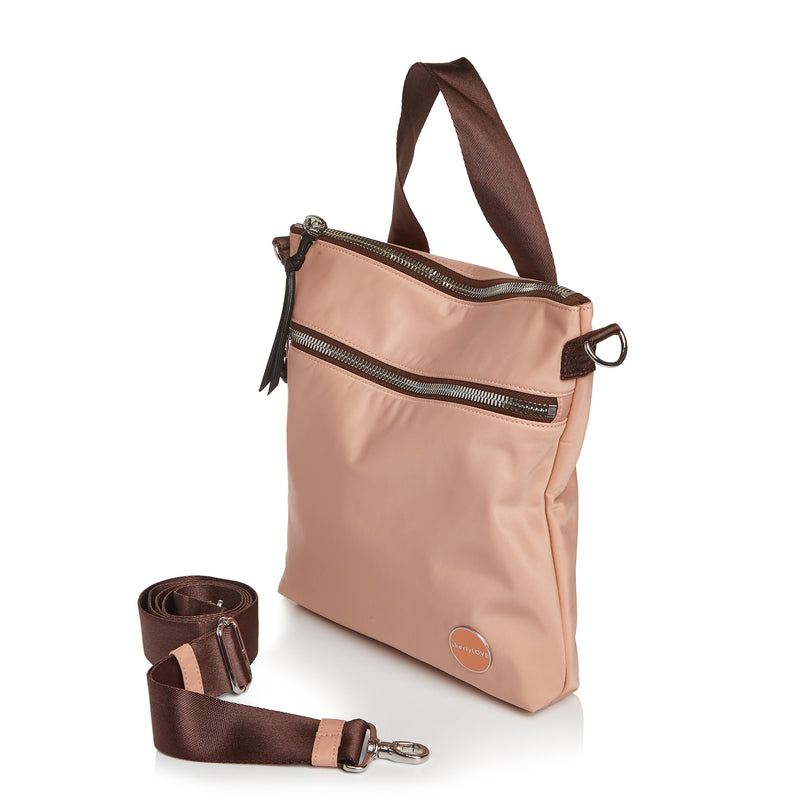 shortyLOVE amuse medium sized crossbody bag in dusty peach; side angle view against white background.