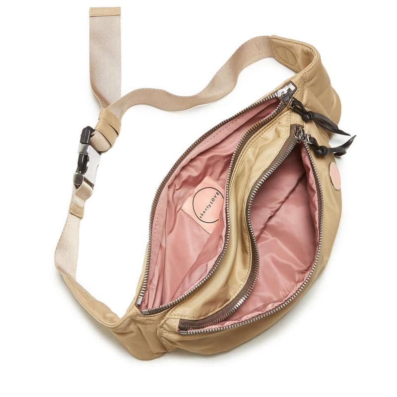 shortyLOVE arcade belt bag in khaki; top-down view showing interior pink lining against white background.