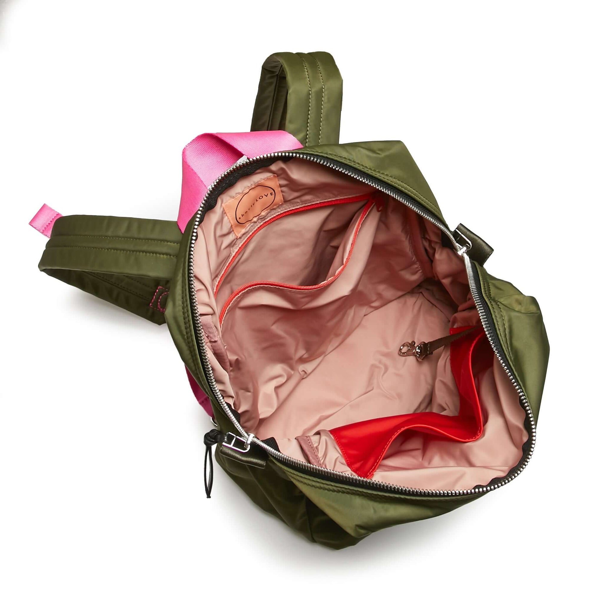 shortyLOVE ace small backpack in army green; top-down view showing interior pink lining against white background.