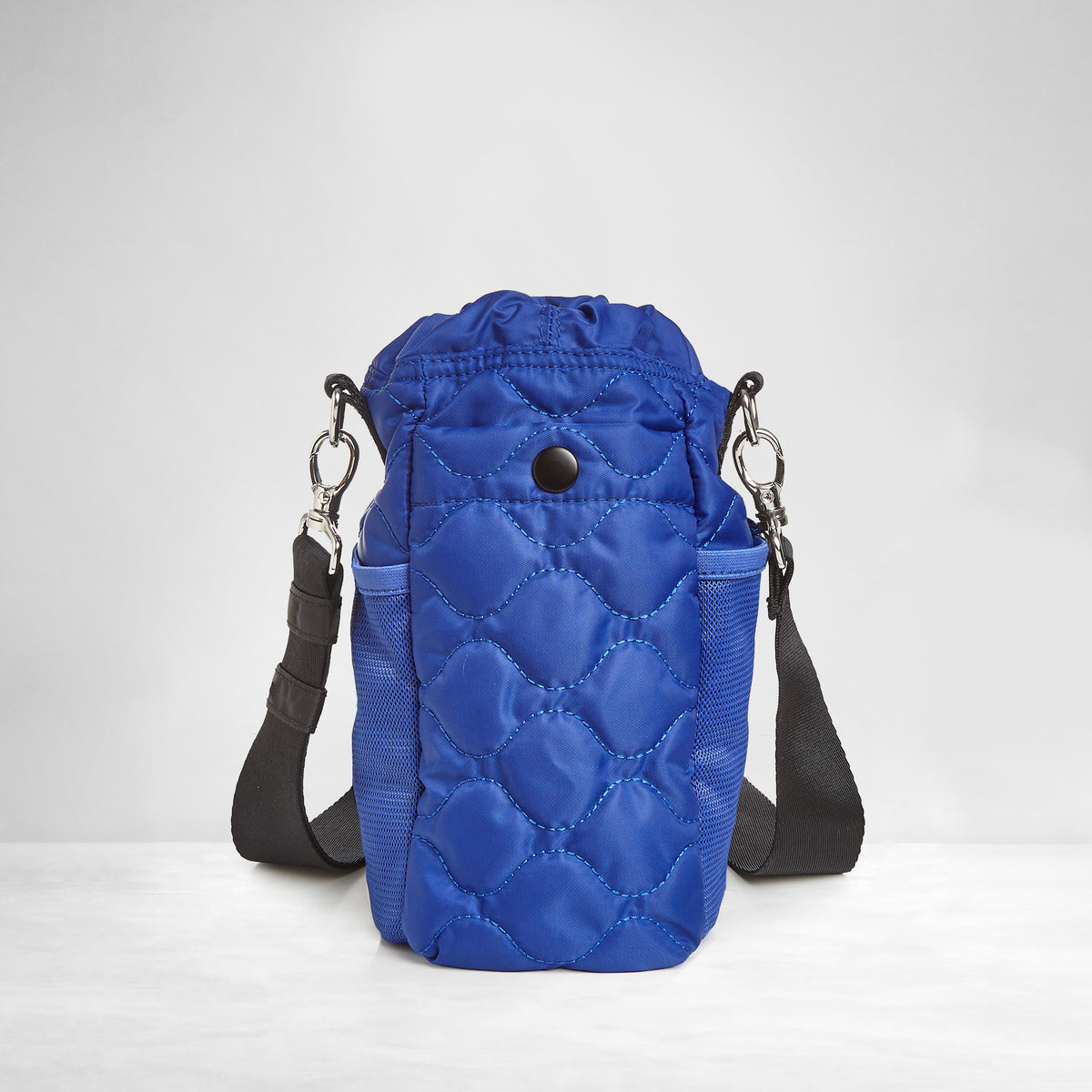 shortyLOVE bea sling bag in electric blue; back view against grey background
