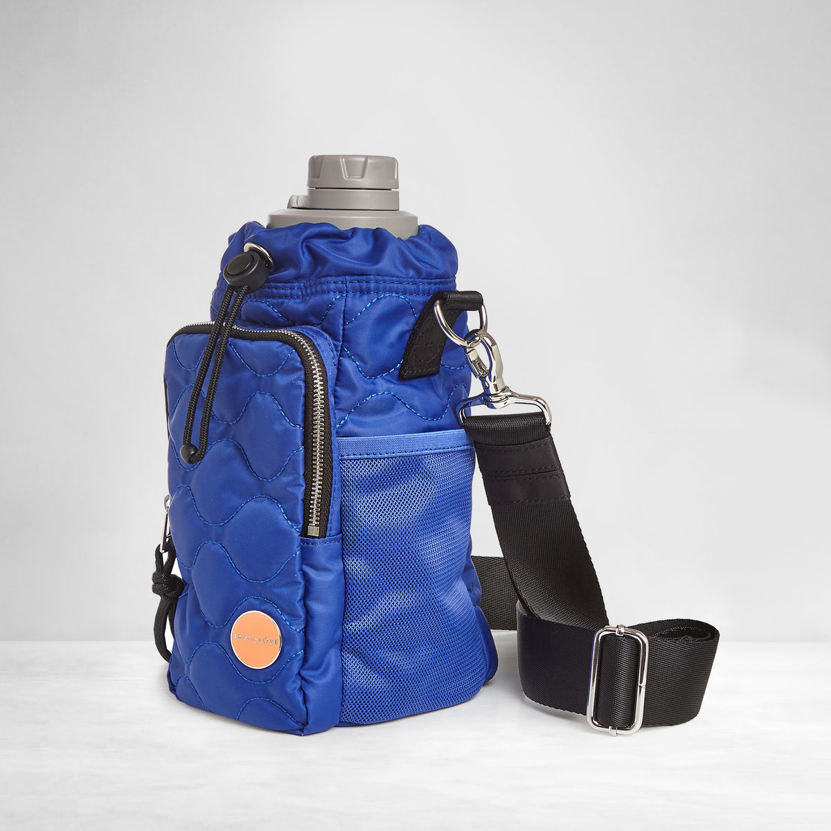 shortyLOVE bea sling bag in electric blue; side view against grey background