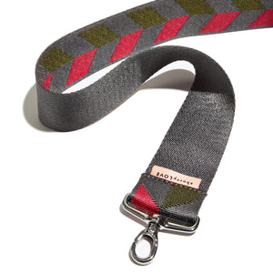 shortyLOVE boardwalk strap in arrow design in pewter/sage/magenta; top view open against white background.
