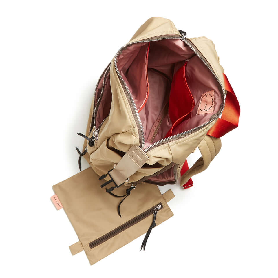 shortyLOVE boxer backpack in khaki; top-down view showing interior pink lining against white background.
