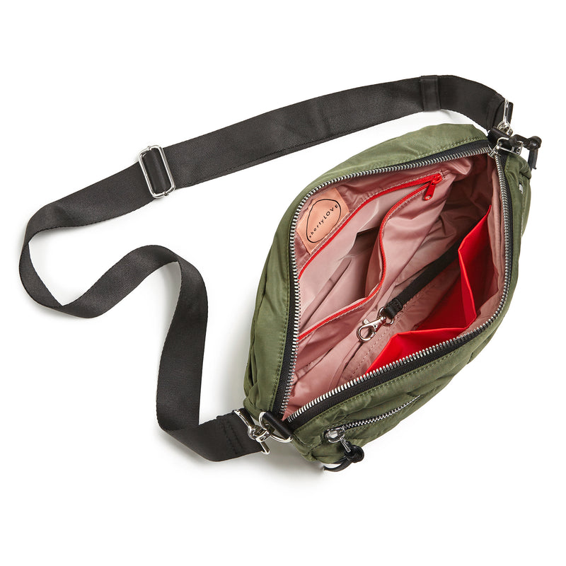 shortyLOVE cruiser medium crossbody bag in sage; top-down view showing interior blush lining against white background.