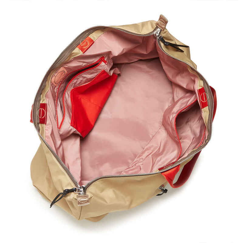 shortyLOVE friday weekender bag in khaki; top-down view showing interior pink lining against white background.