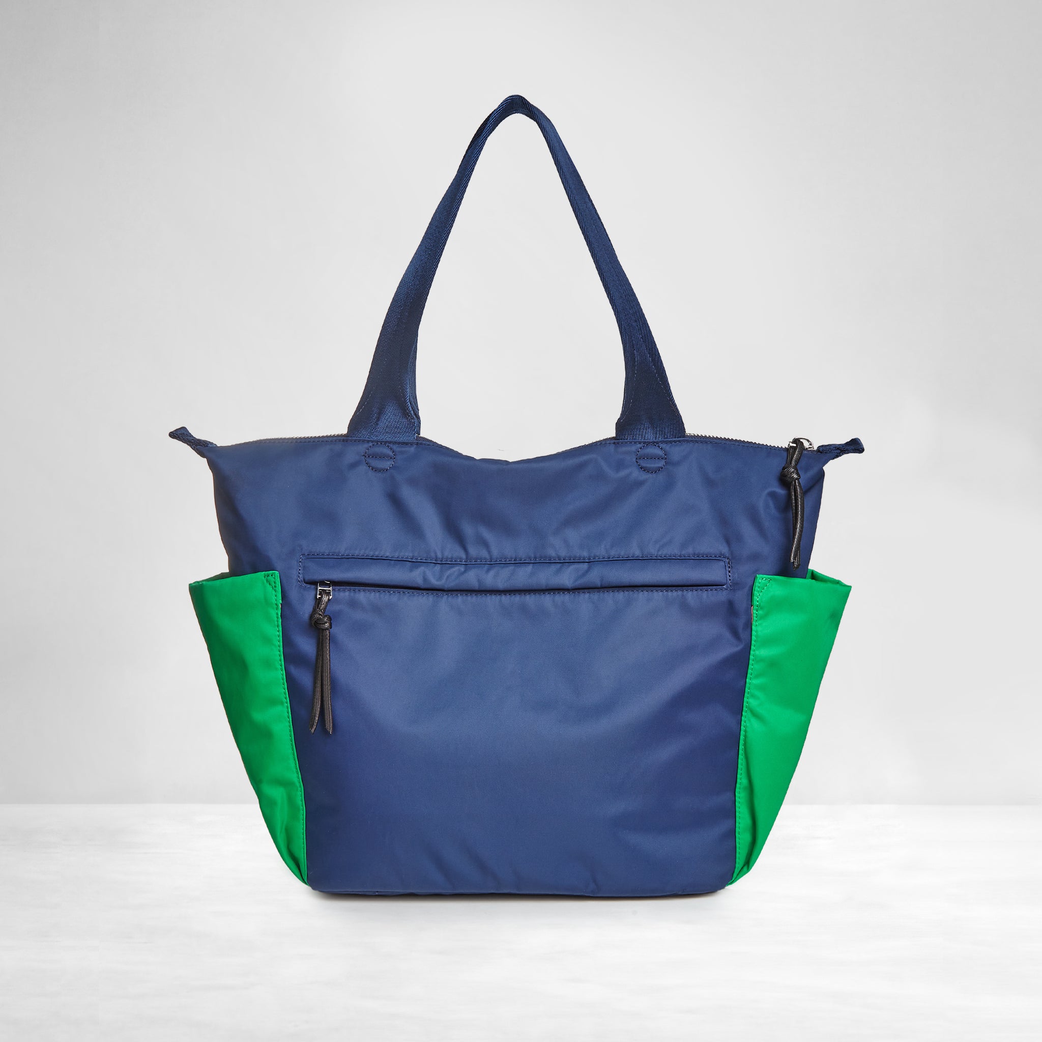 shortyLOVE tillie tote bag in grass green/navy; side angle view against white background.