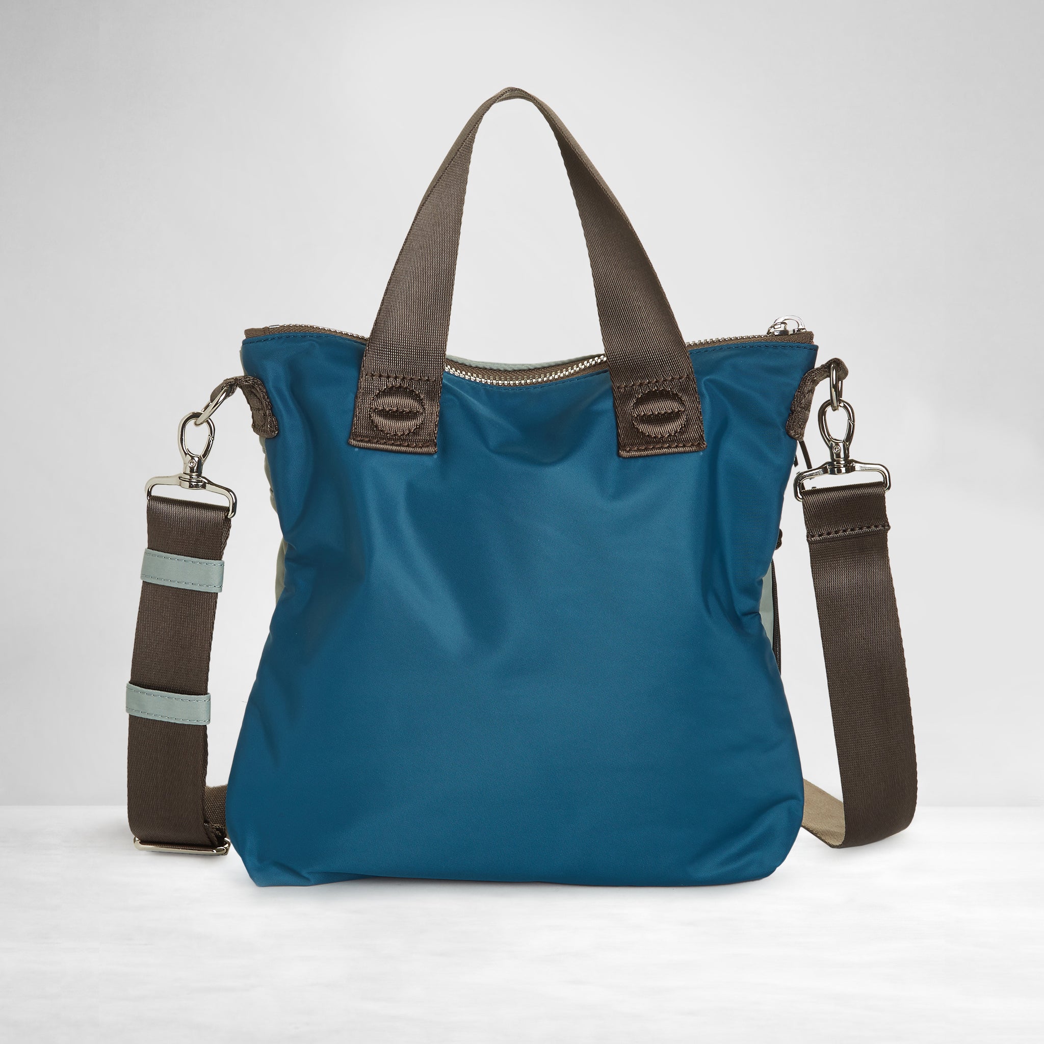 shortyLOVE amuse medium sized crossbody bag in slate/teal; back view against white background.