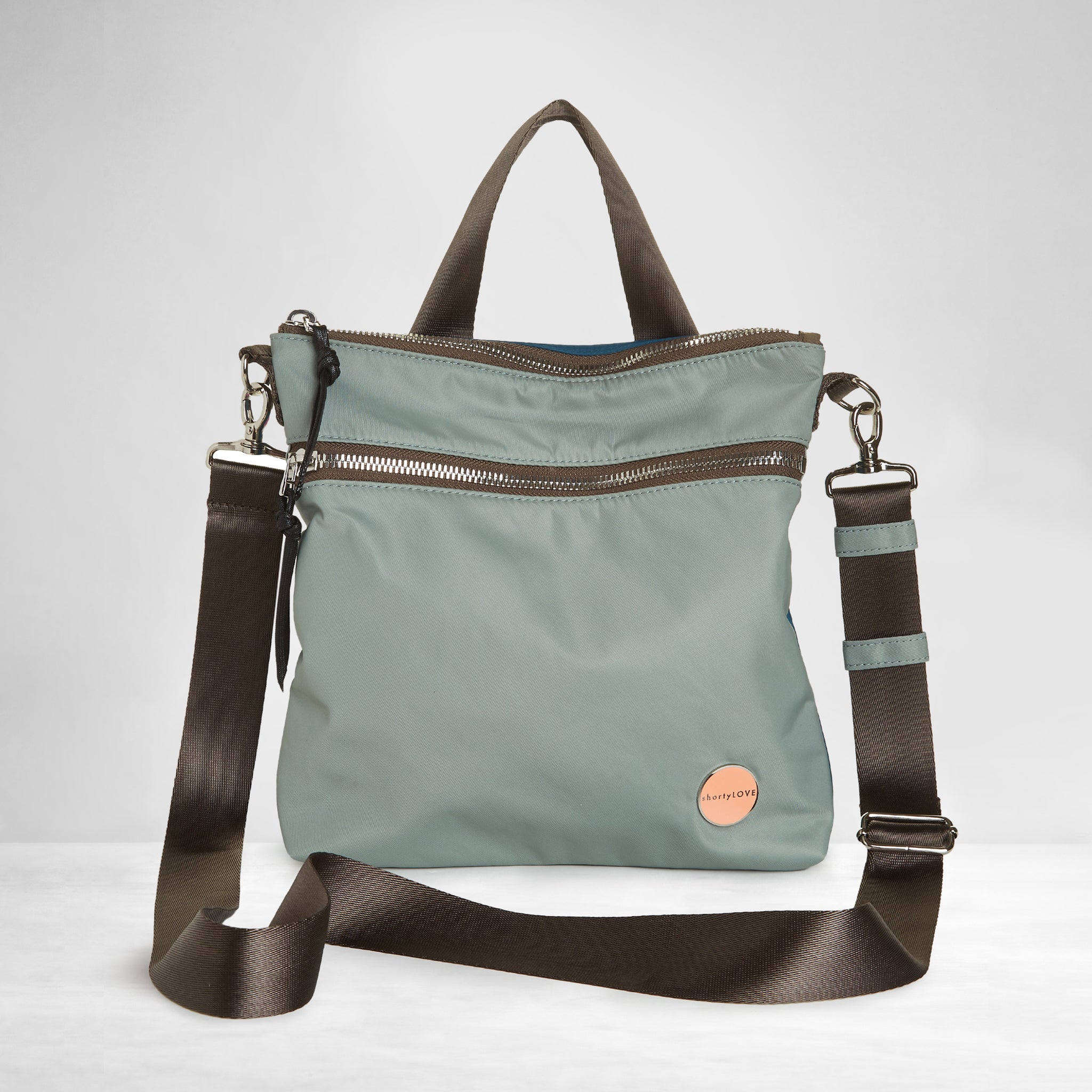shortyLOVE amuse medium sized crossbody bag in slate/teal; front view against white background.