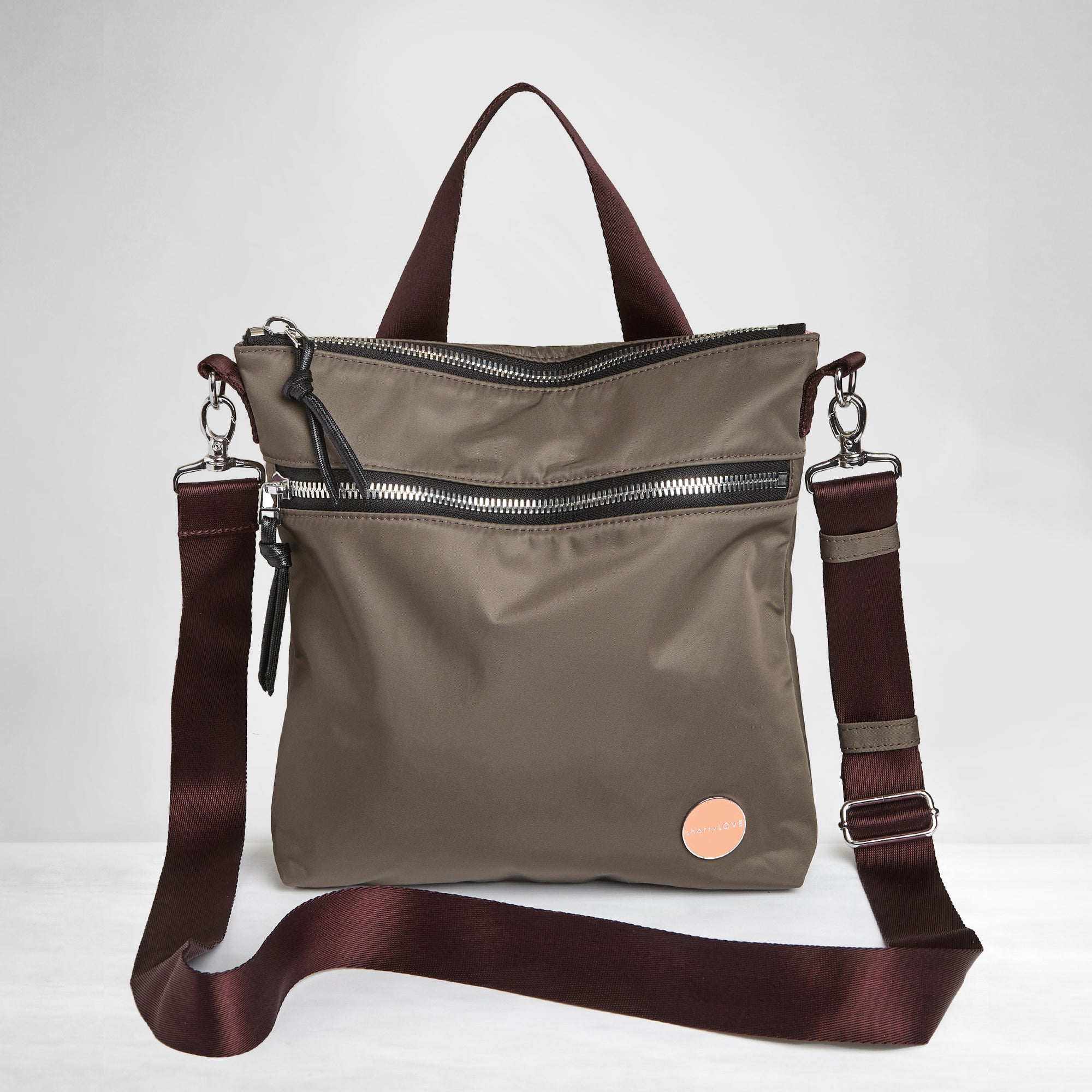 shortyLOVE amuse medium sized crossbody bag in mocha; front view against white background.