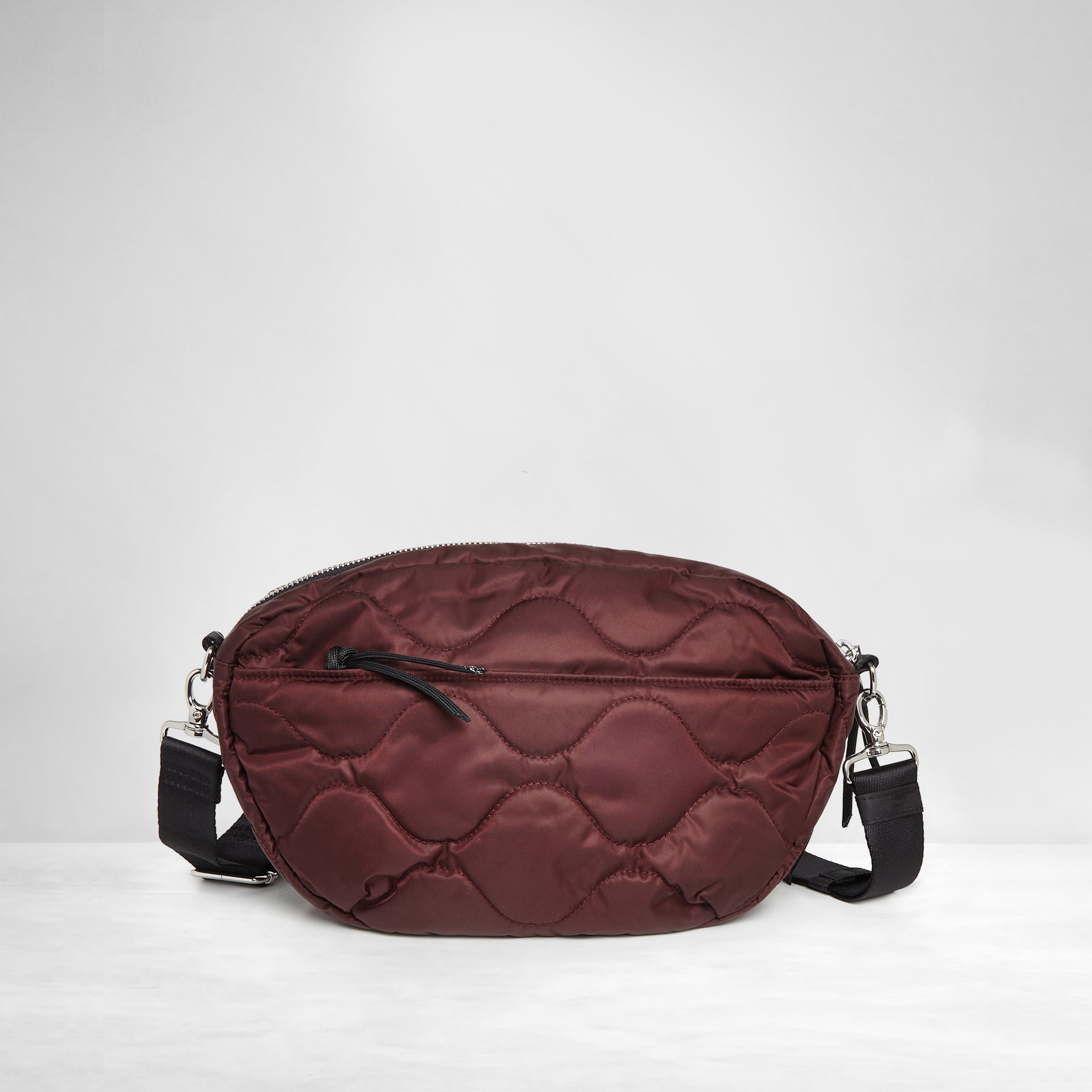shortyLOVE cruiser medium crossbody bag in bordeaux; back view against white background.