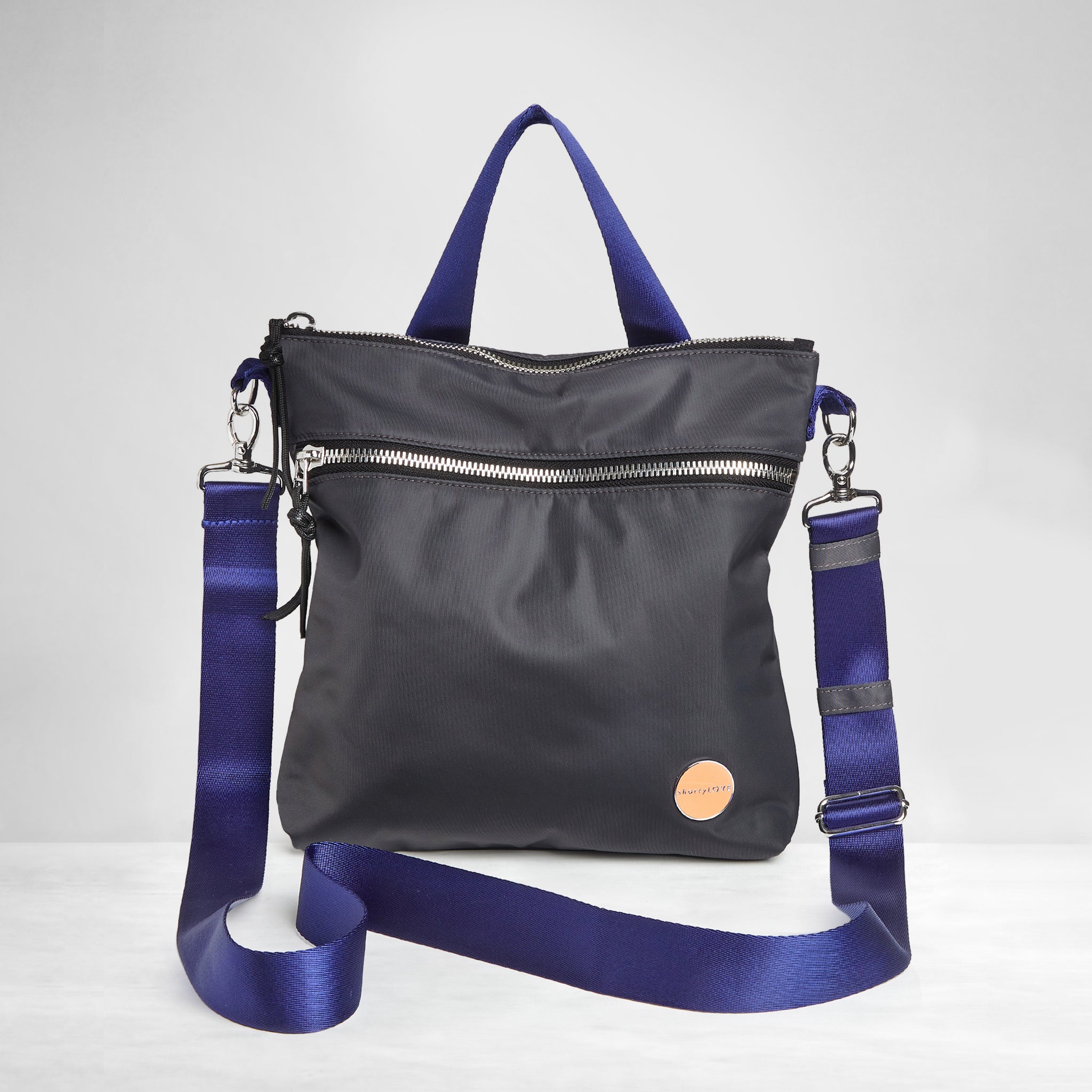 shortyLOVE amuse medium sized crossbody bag in charcoal; front view against white background.