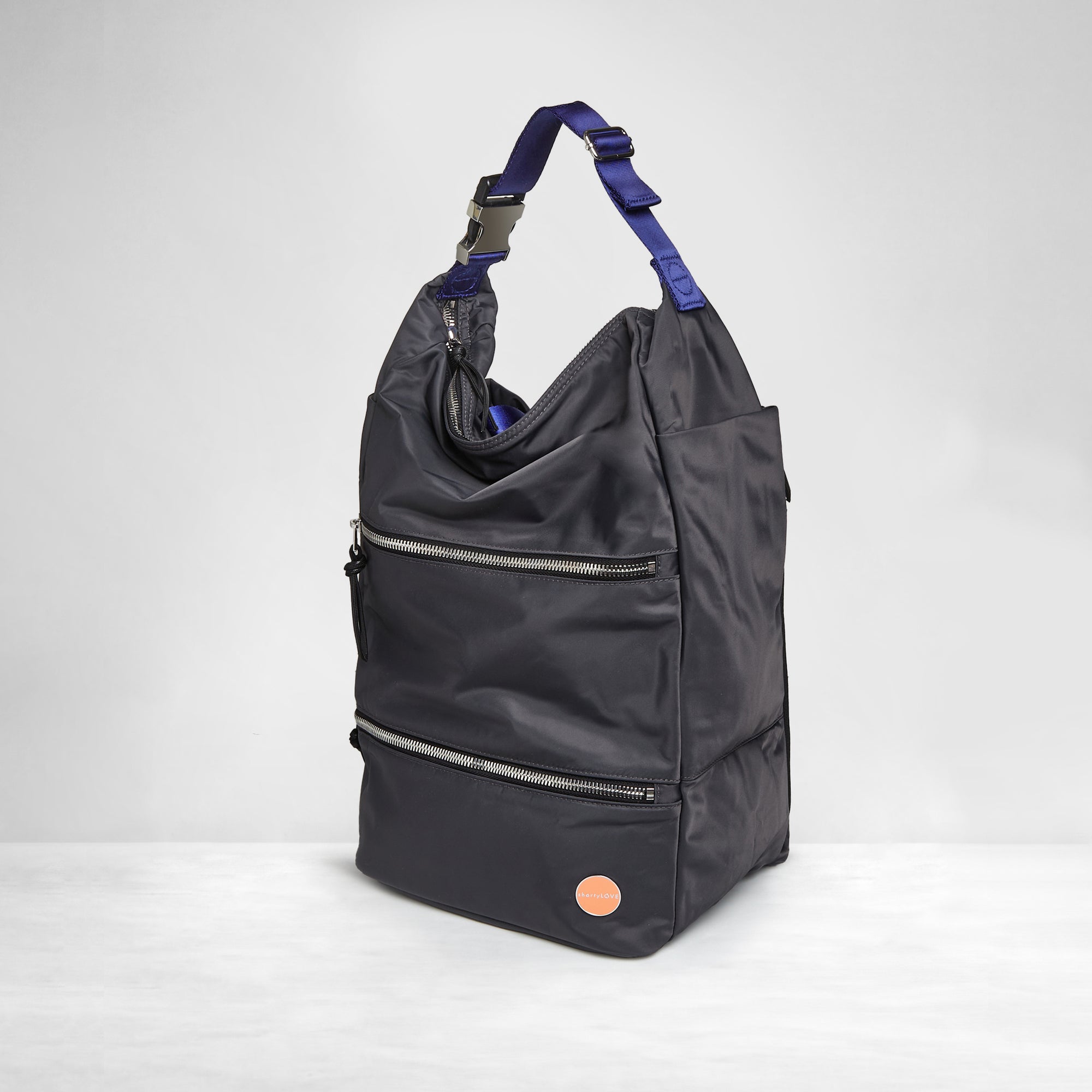 shortyLOVE boxer backpack in charcoal; side angle view against white background.