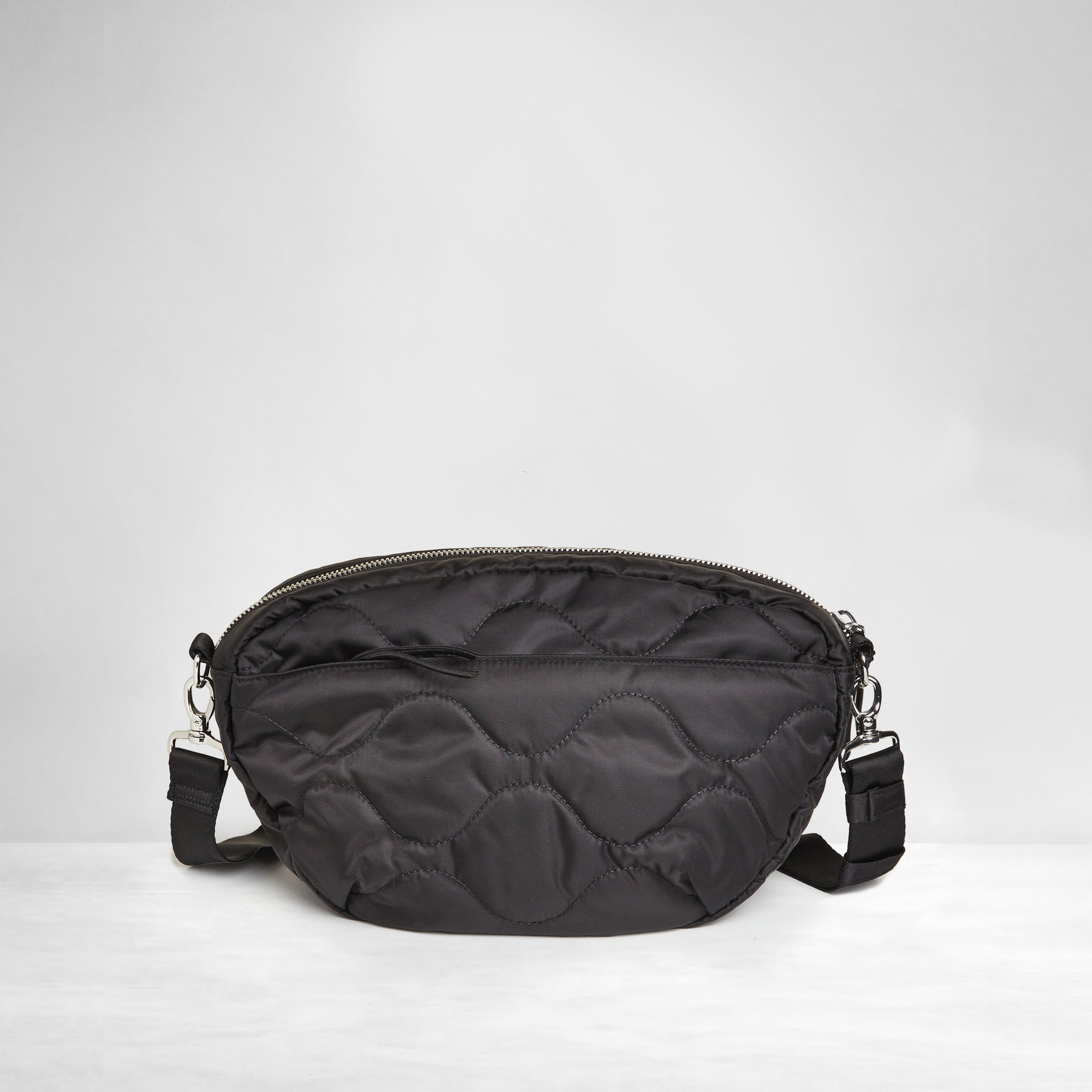 shortyLOVE cruiser medium crossbody bag in black; back view against white background.