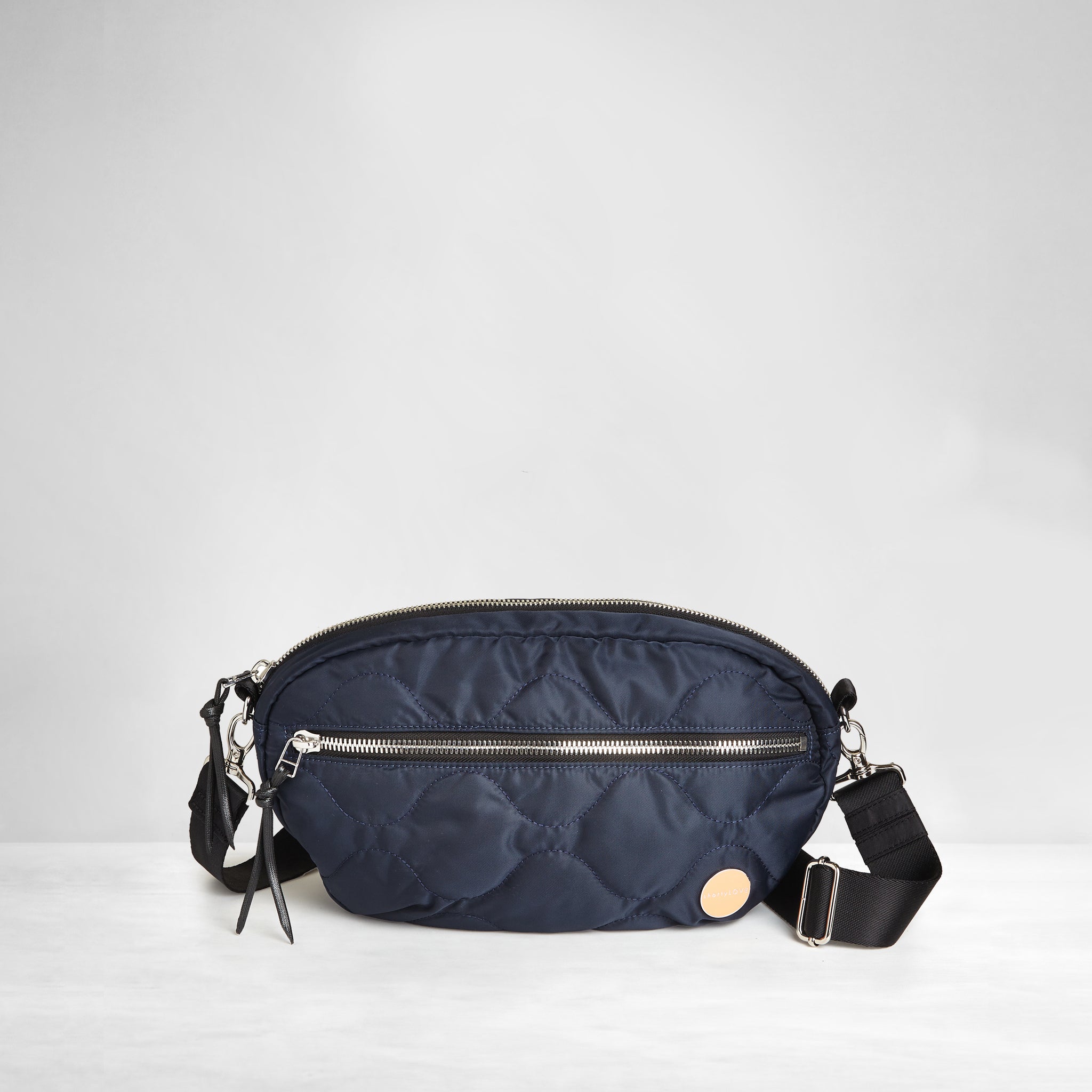 shortyLOVE cruiser medium crossbody bag in midnight; front view against white background.