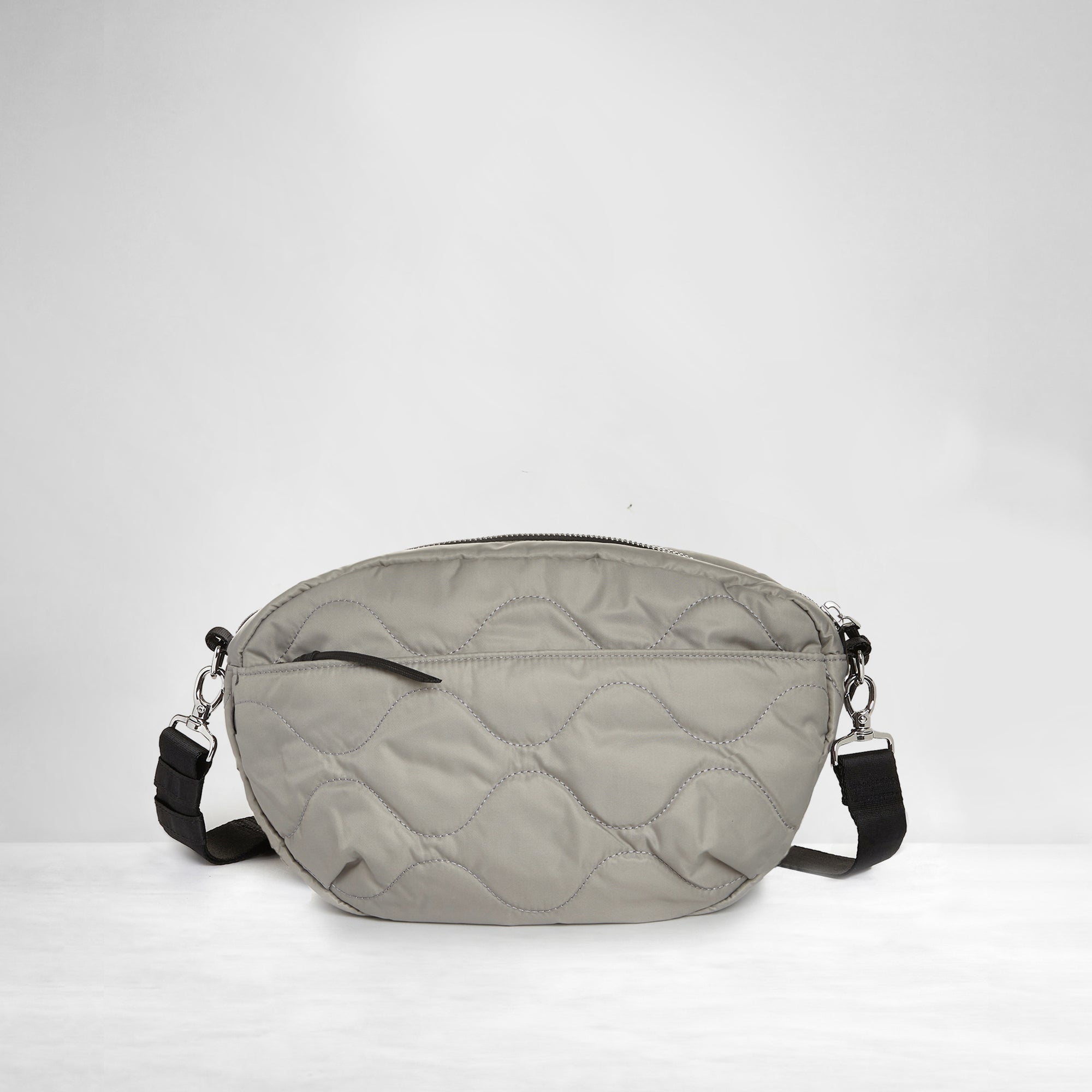 shortyLOVE cruiser medium crossbody bag in milky grey; back view against white background.