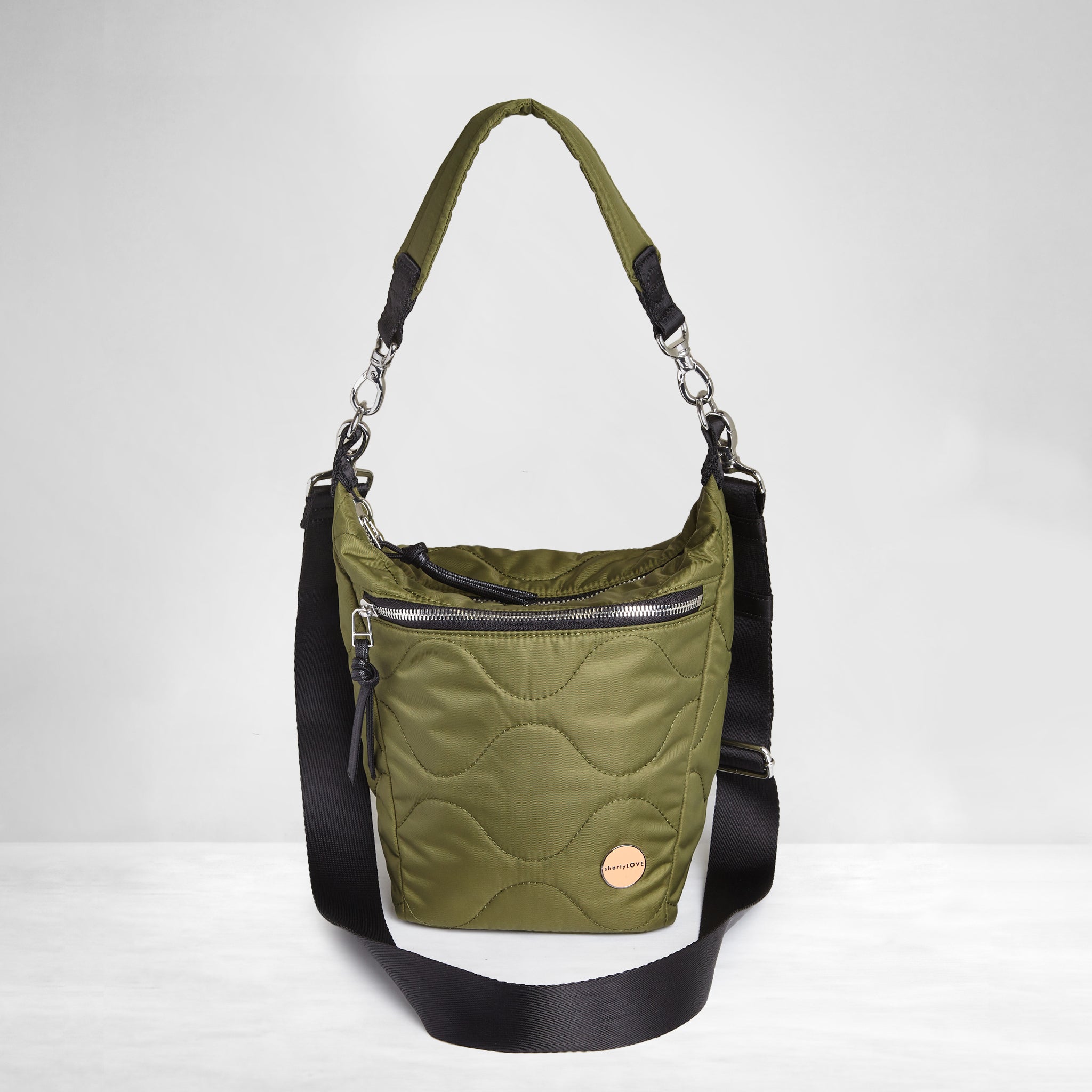 shortyLOVE marcel crossbody bucket bag in sage; front view against white background.