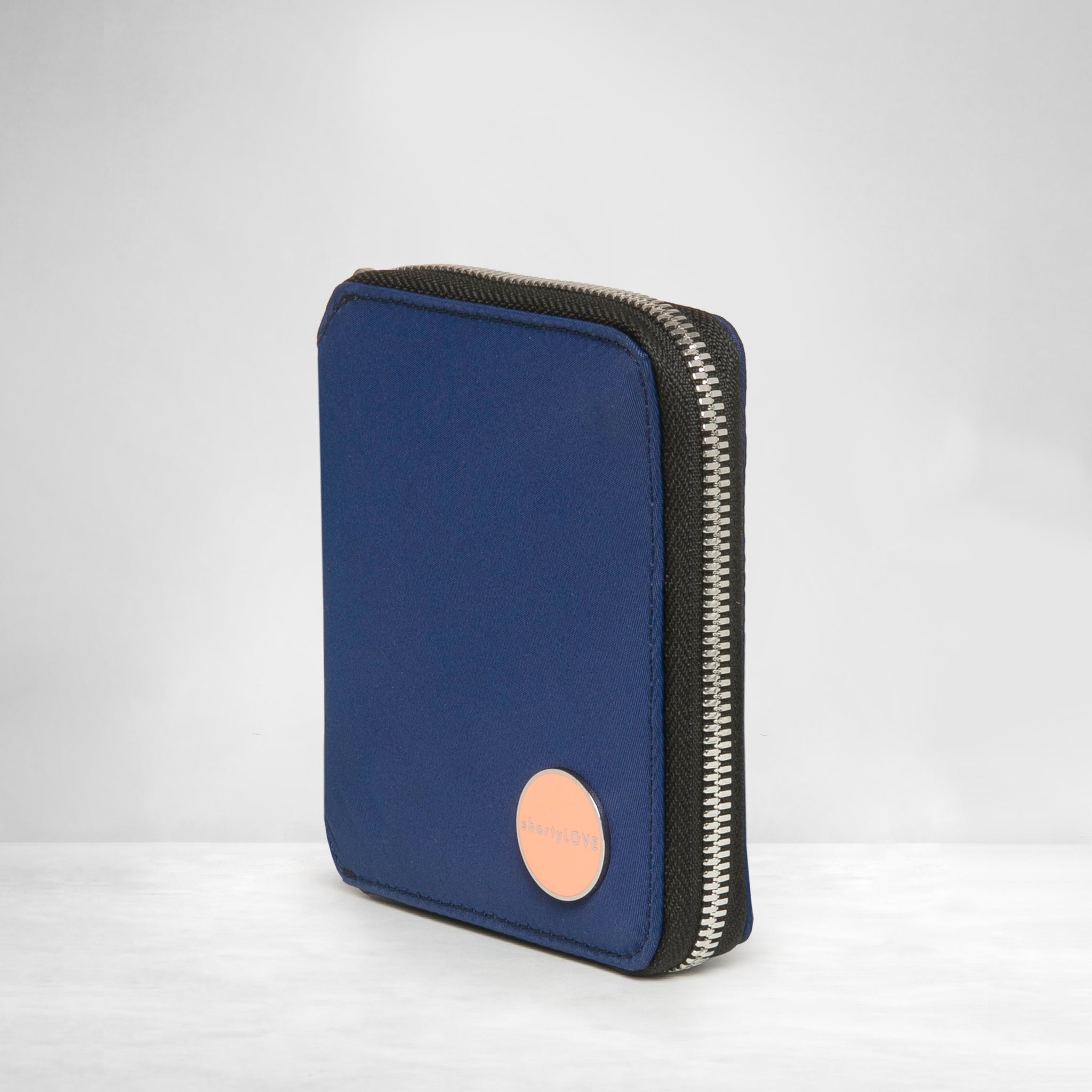 shortyLOVE merchant small wallet in navy; side angle view against white background.