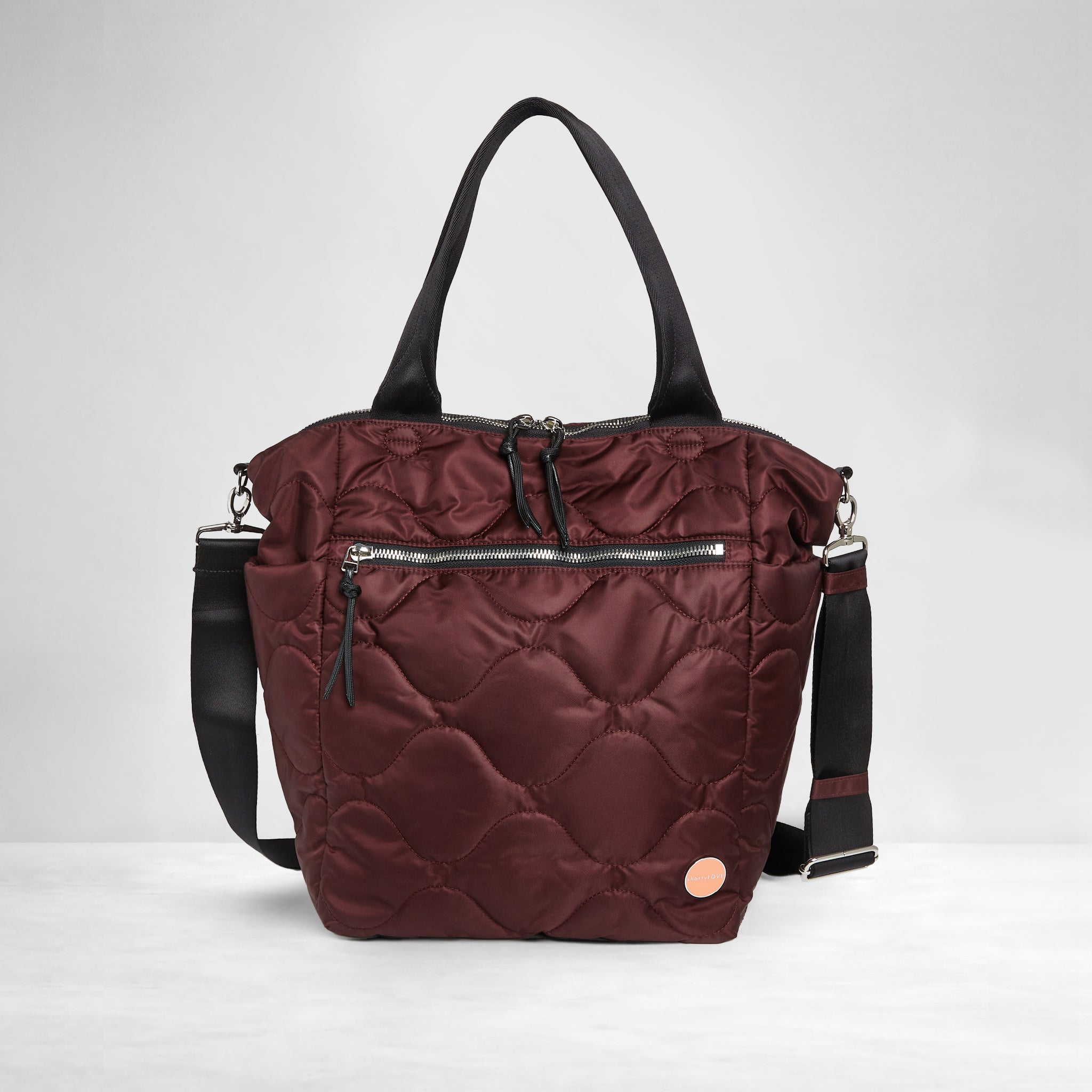 shortyLOVE ranger large quilted crossbody tote bag in bordeaux; front view against white background