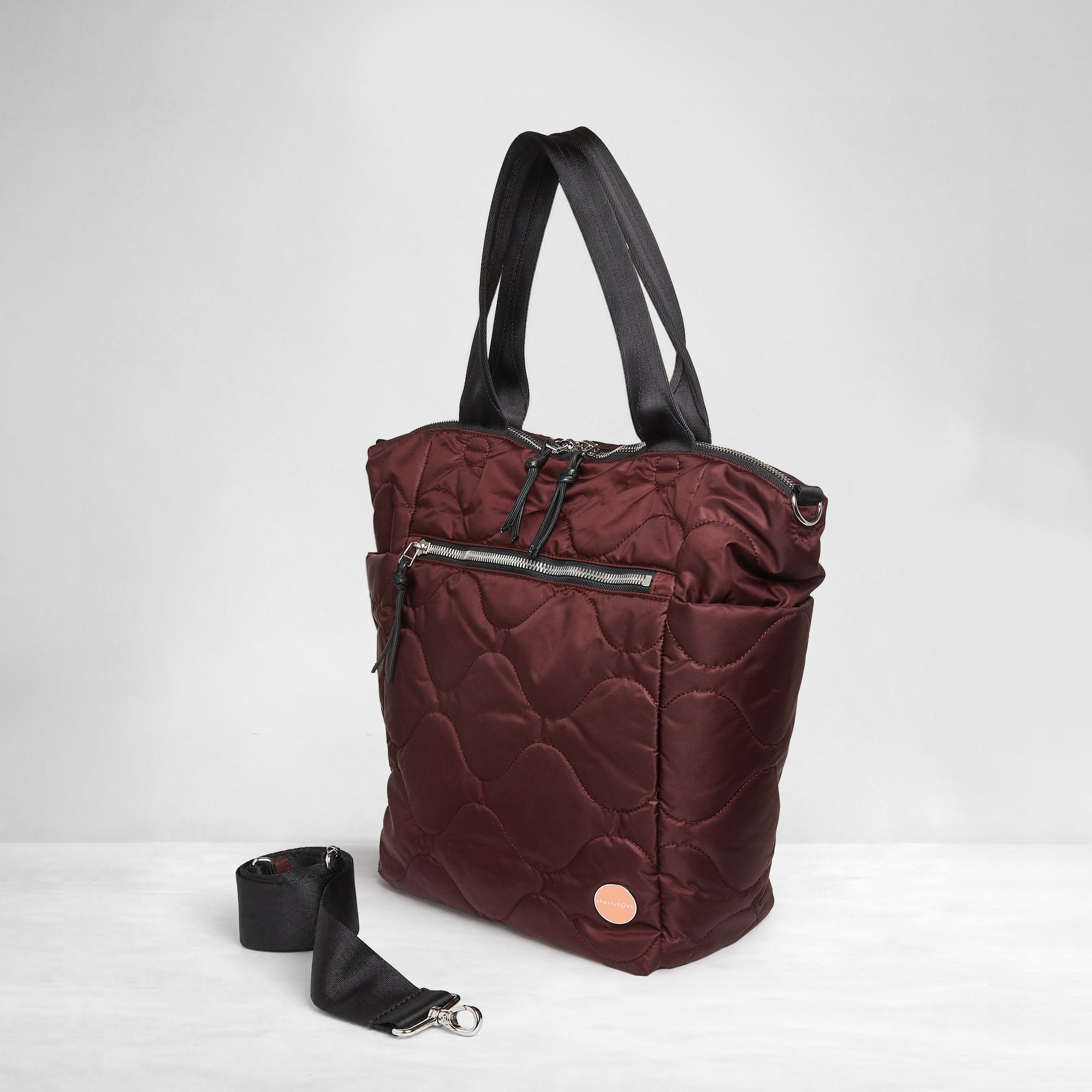 shortyLOVE ranger large quilted crossbody tote bag in bordeaux; side view against white background