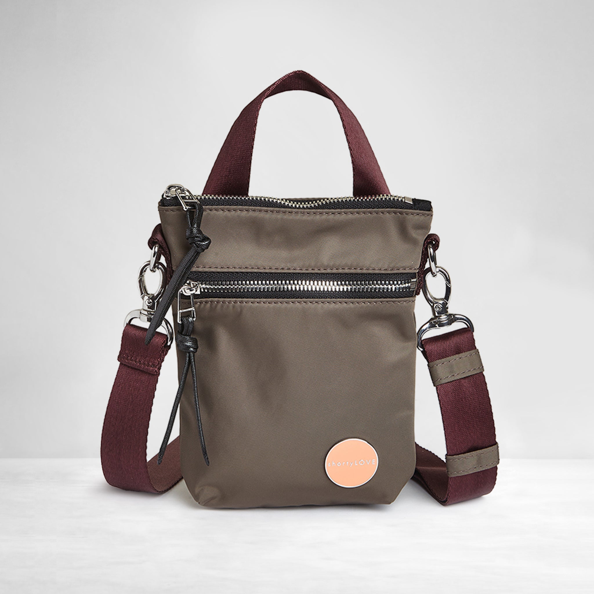 shortyLOVE shorthand small crossbody bag in mocha; front view against white background.