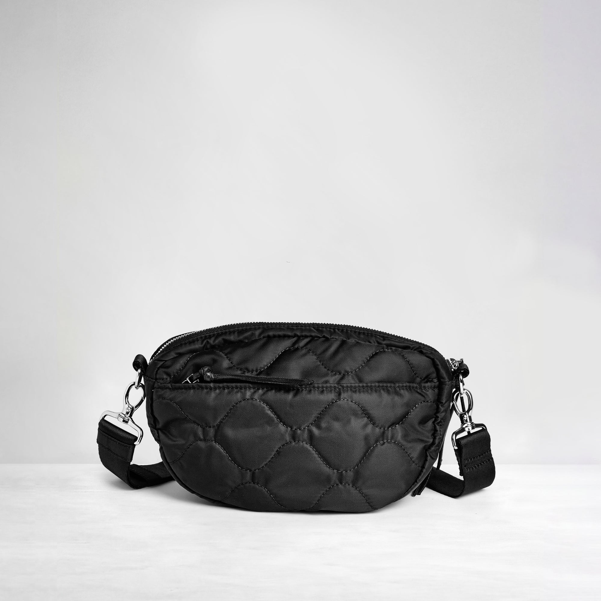 shortyLOVE small cruiser small crossbody bag in black; back view against white background.