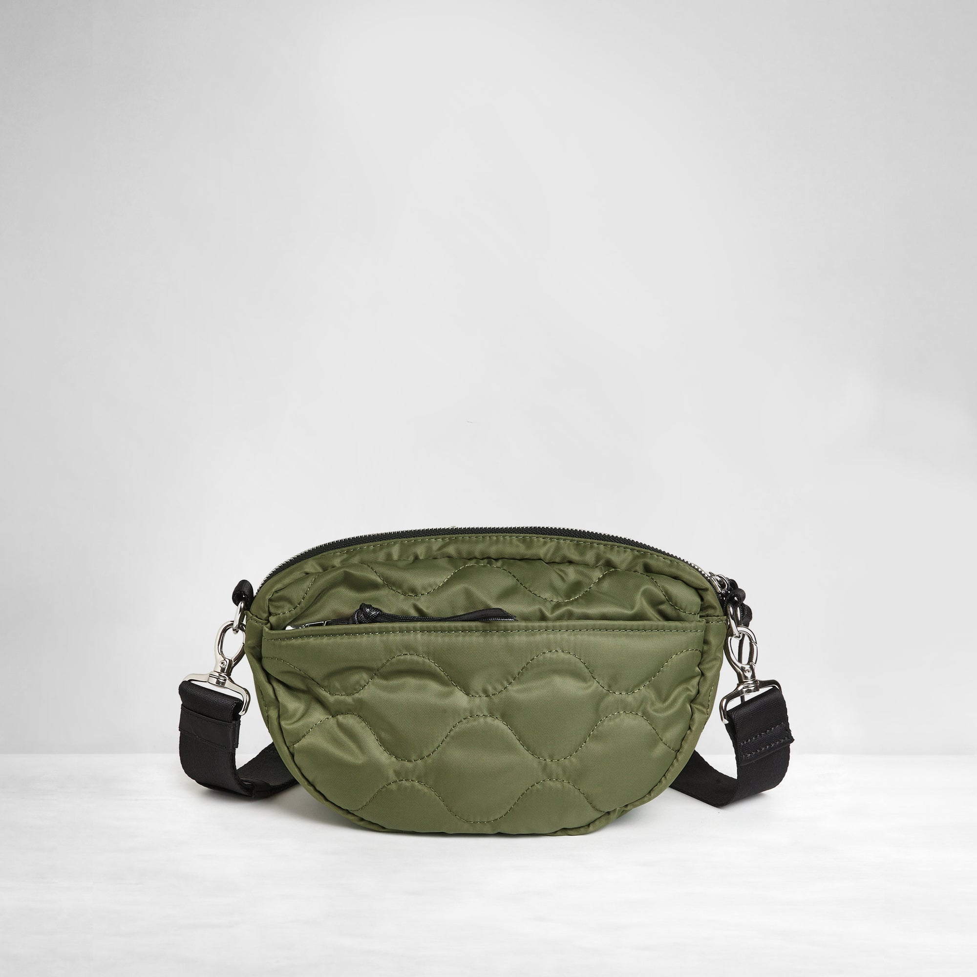 shortyLOVE small cruiser small crossbody bag in sage; back view against white background.