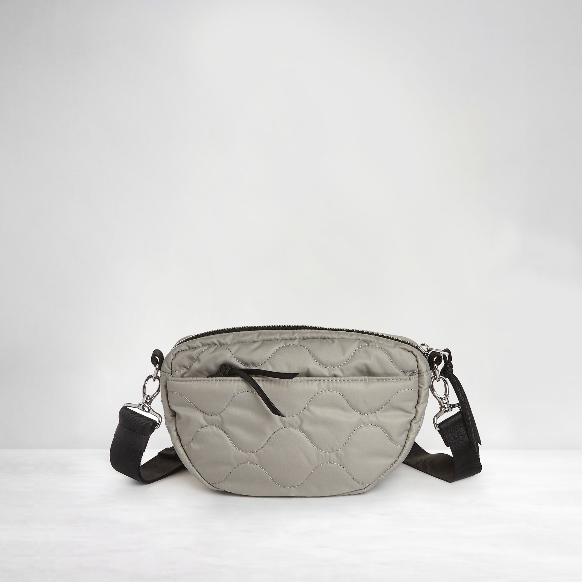 shortyLOVE small cruiser small crossbody bag in milky grey; back view against white background.
