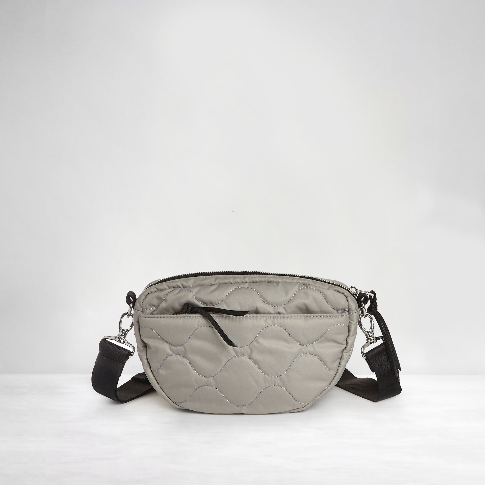 shortyLOVE small cruiser small crossbody bag in milky grey; back view against white background.