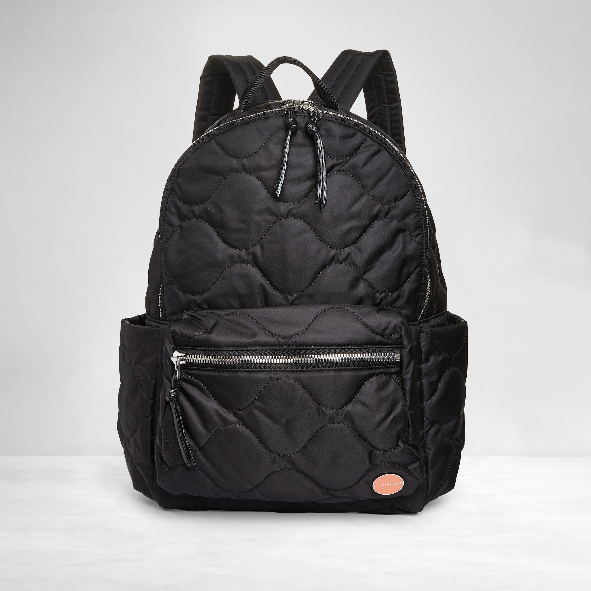 shortyLOVE tate backpack in black; front view against white background