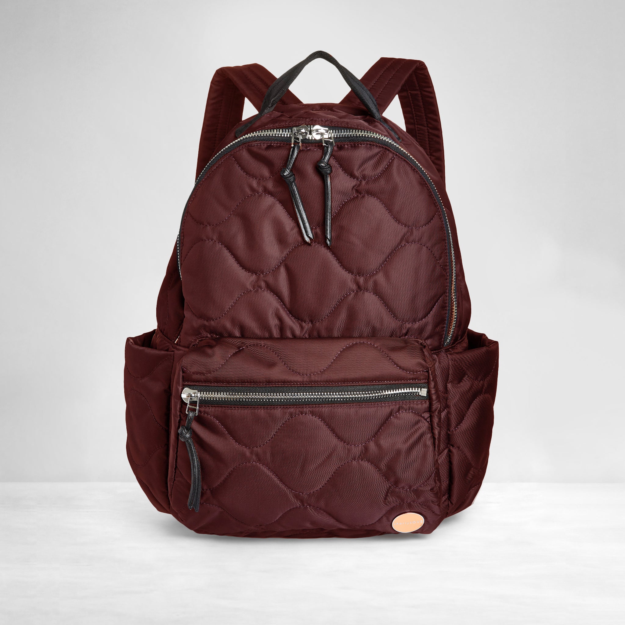 shortyLOVE tate backpack in bordeaux; front view against white background