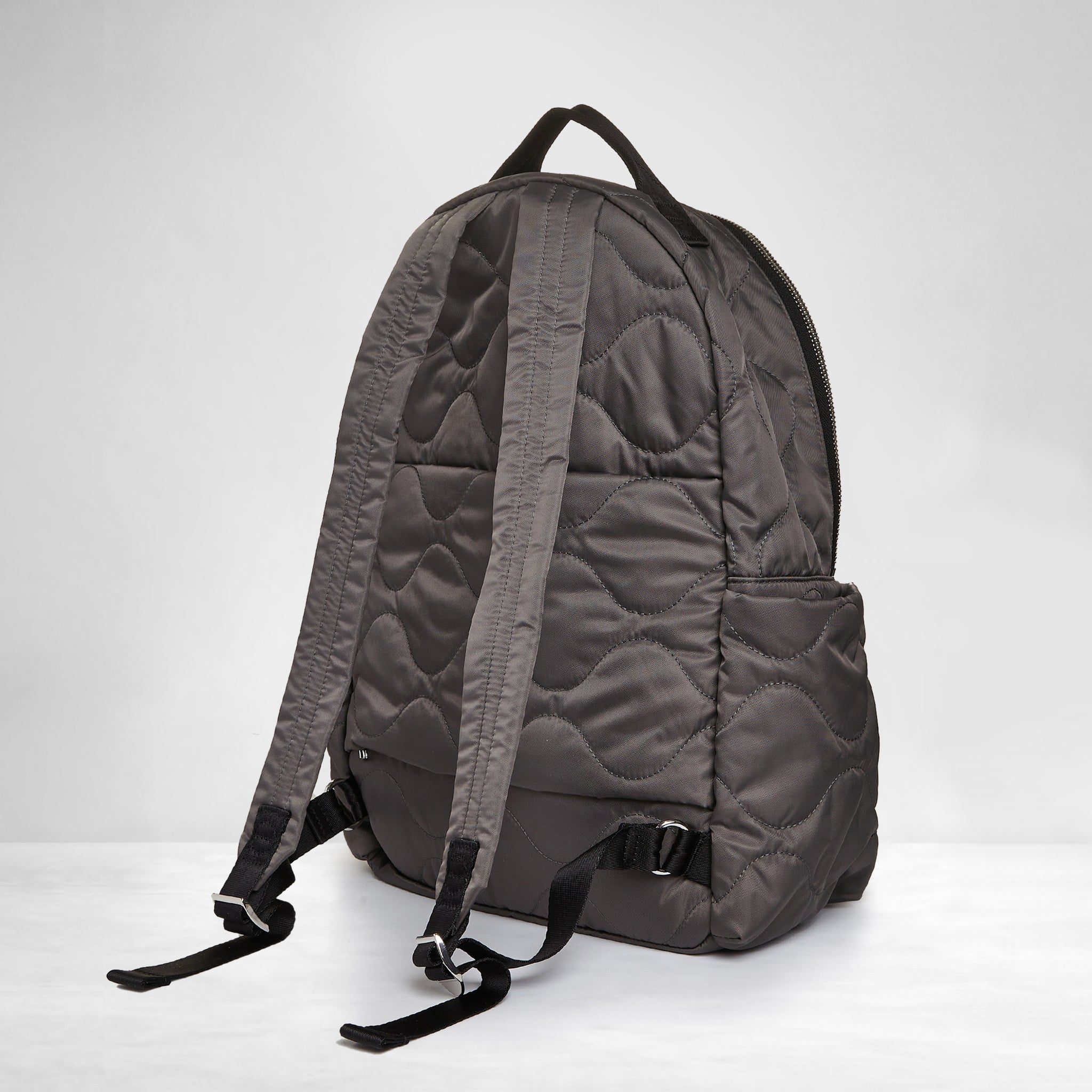 shortyLOVE tate backpack in pewter; back view against white background.