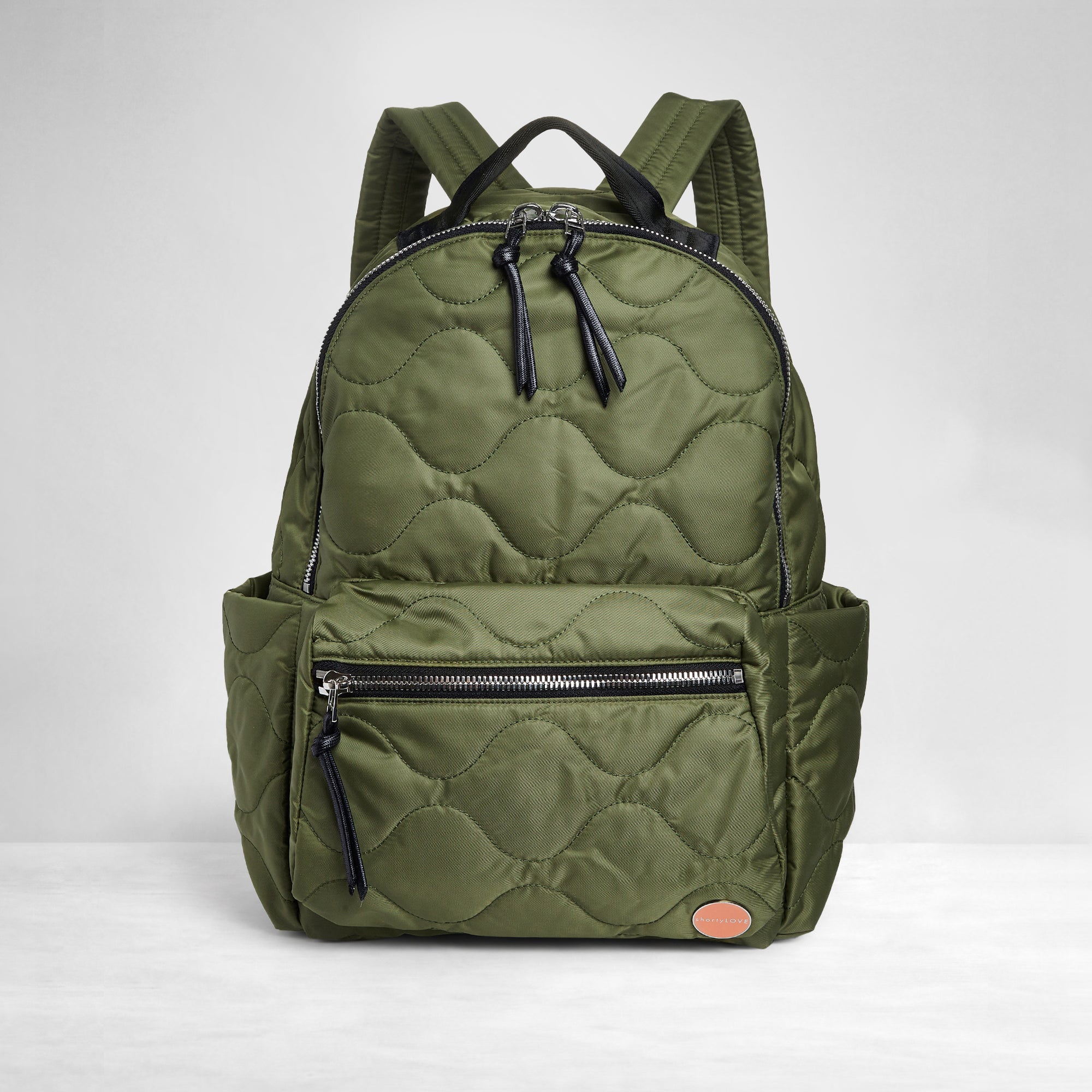 shortyLOVE tate backpack in sage; front view against white background.