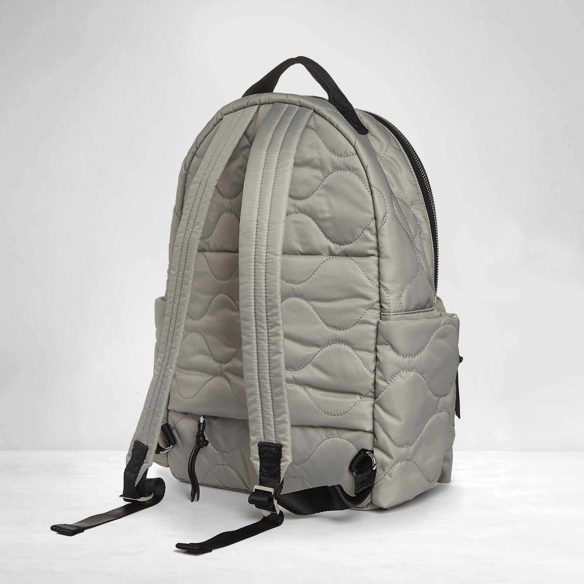 shortyLOVE tate backpack in milky grey; back view against white background.
