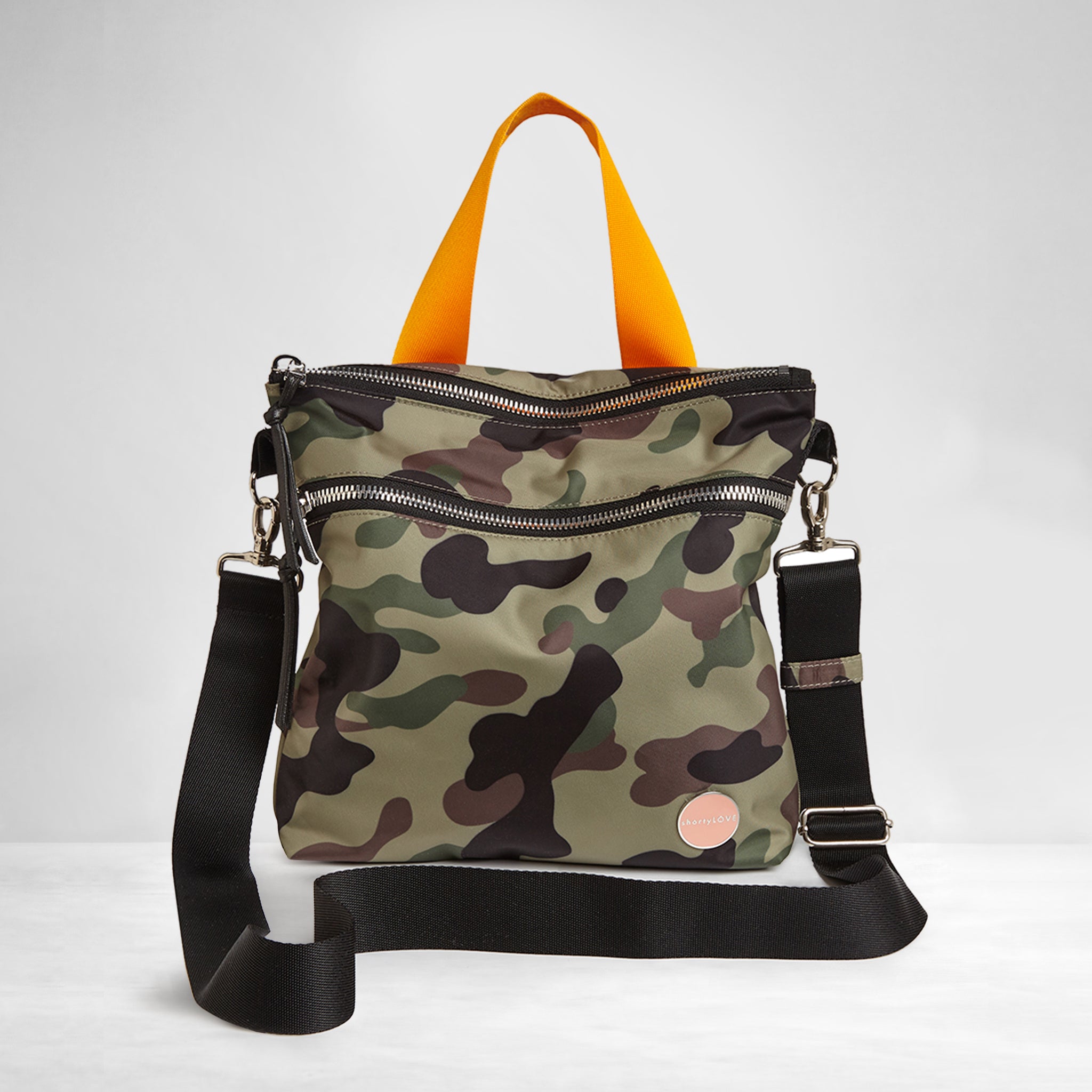 shortyLOVE amuse medium sized crossbody bag in green camo; front view against white background.