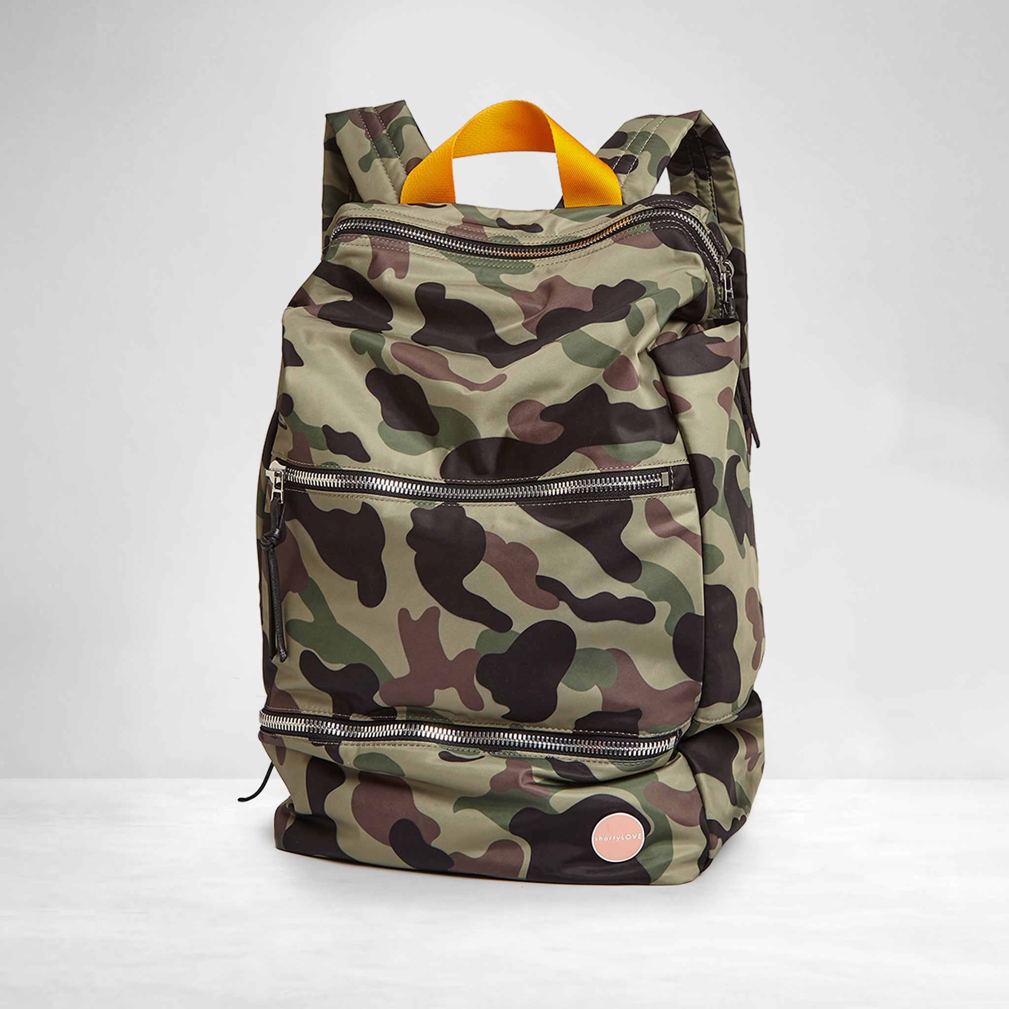 shortyLOVE boxer backpack bag in green camo; front view against white background.