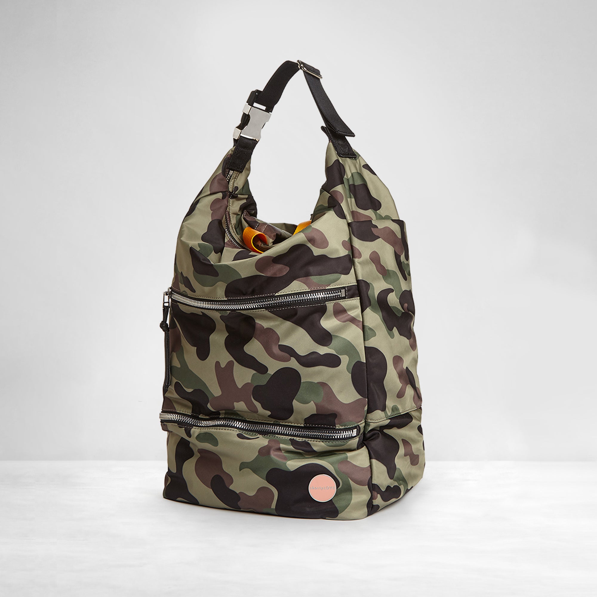 shortyLOVE boxer backpack bag in green camo; side angle view against white background.