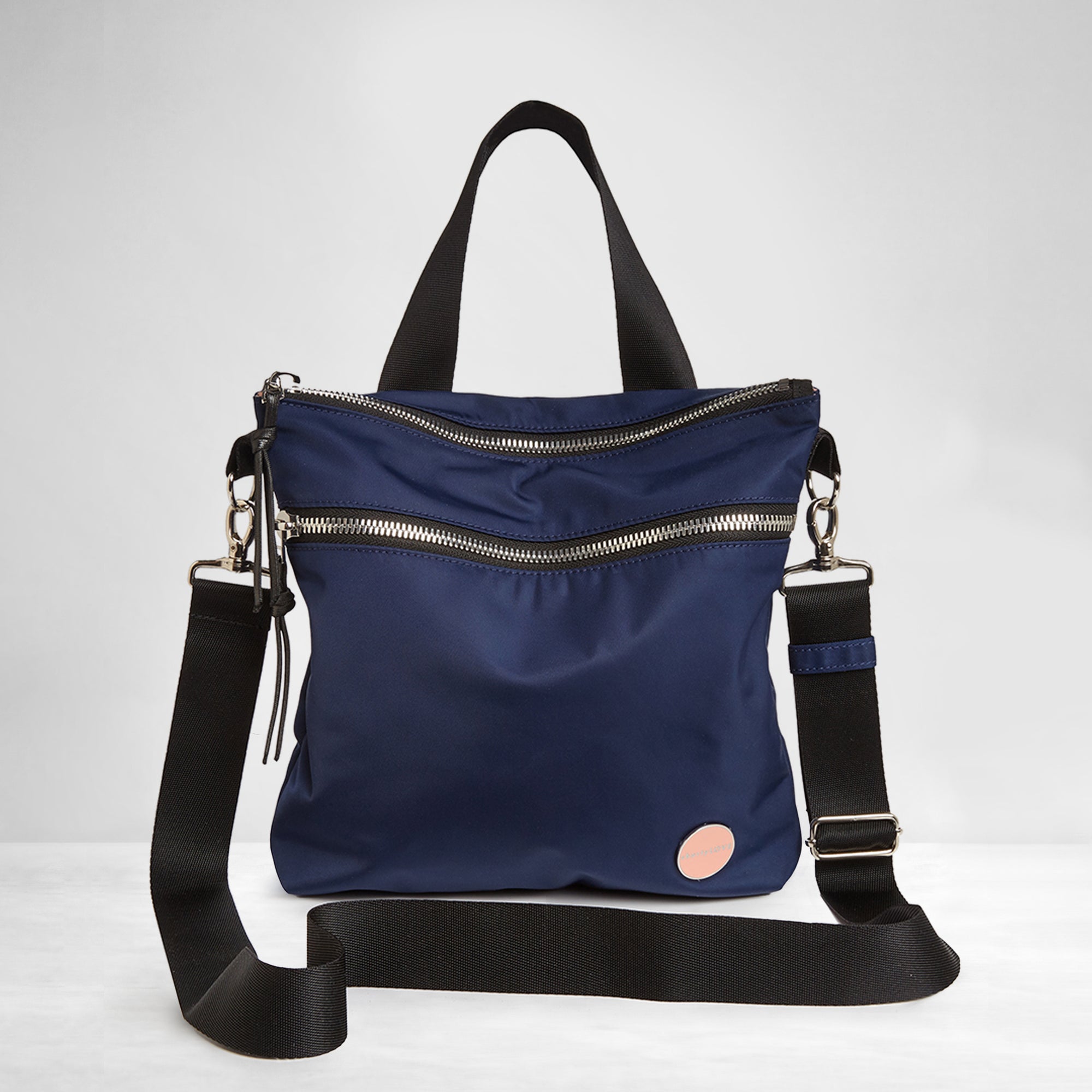 shortyLOVE amuse medium sized crossbody bag in navy; front view against white background.