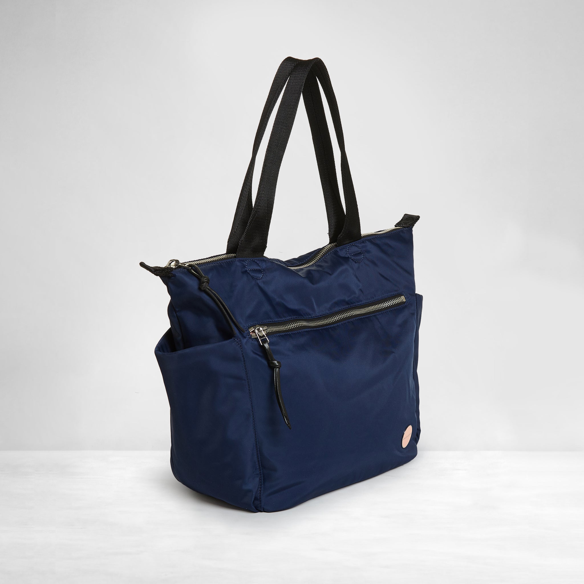 shortyLOVE tillie tote bag in navy; side angle view against white background.