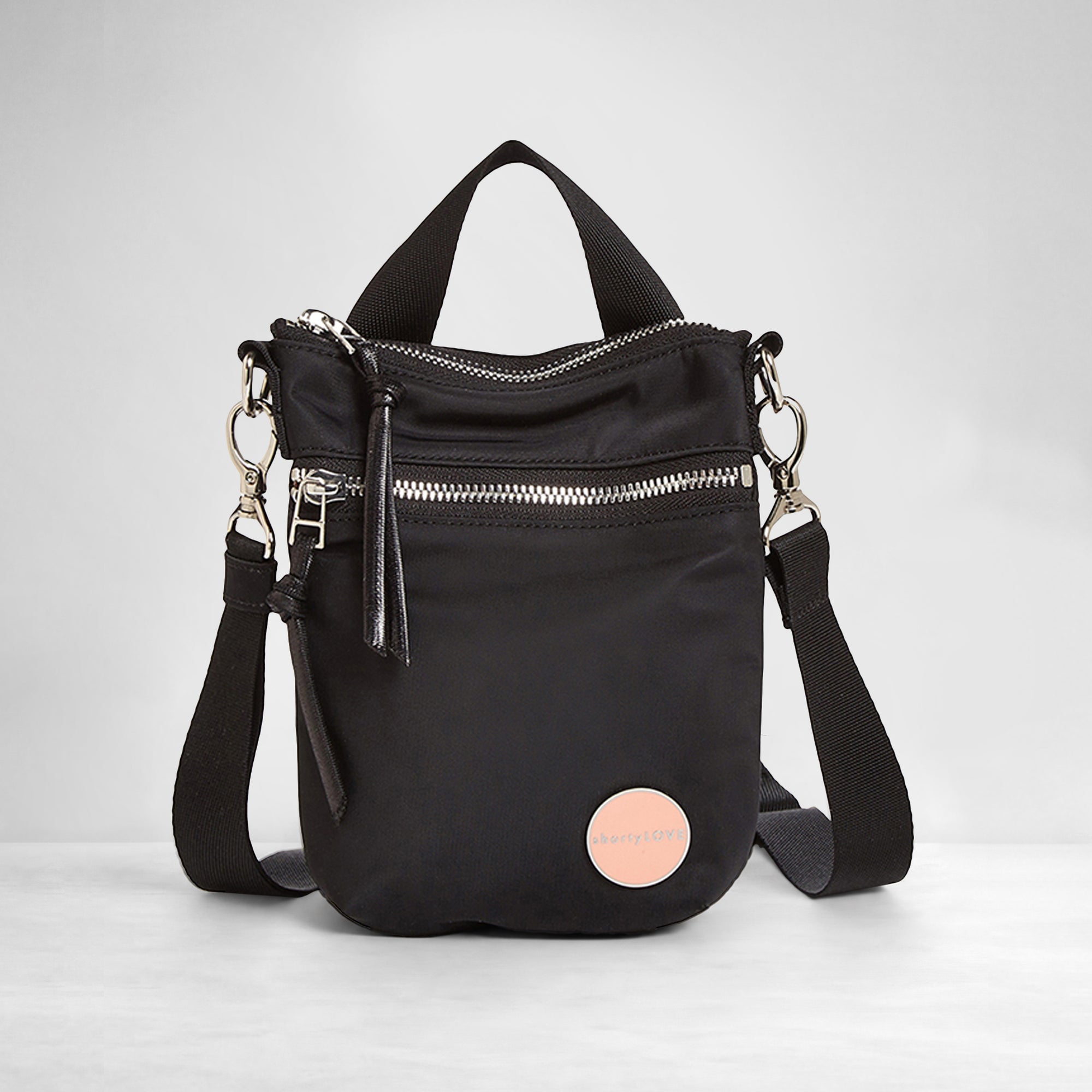 shortyLOVE shorthand women’s designer crossbody handbag in black; front view against white background