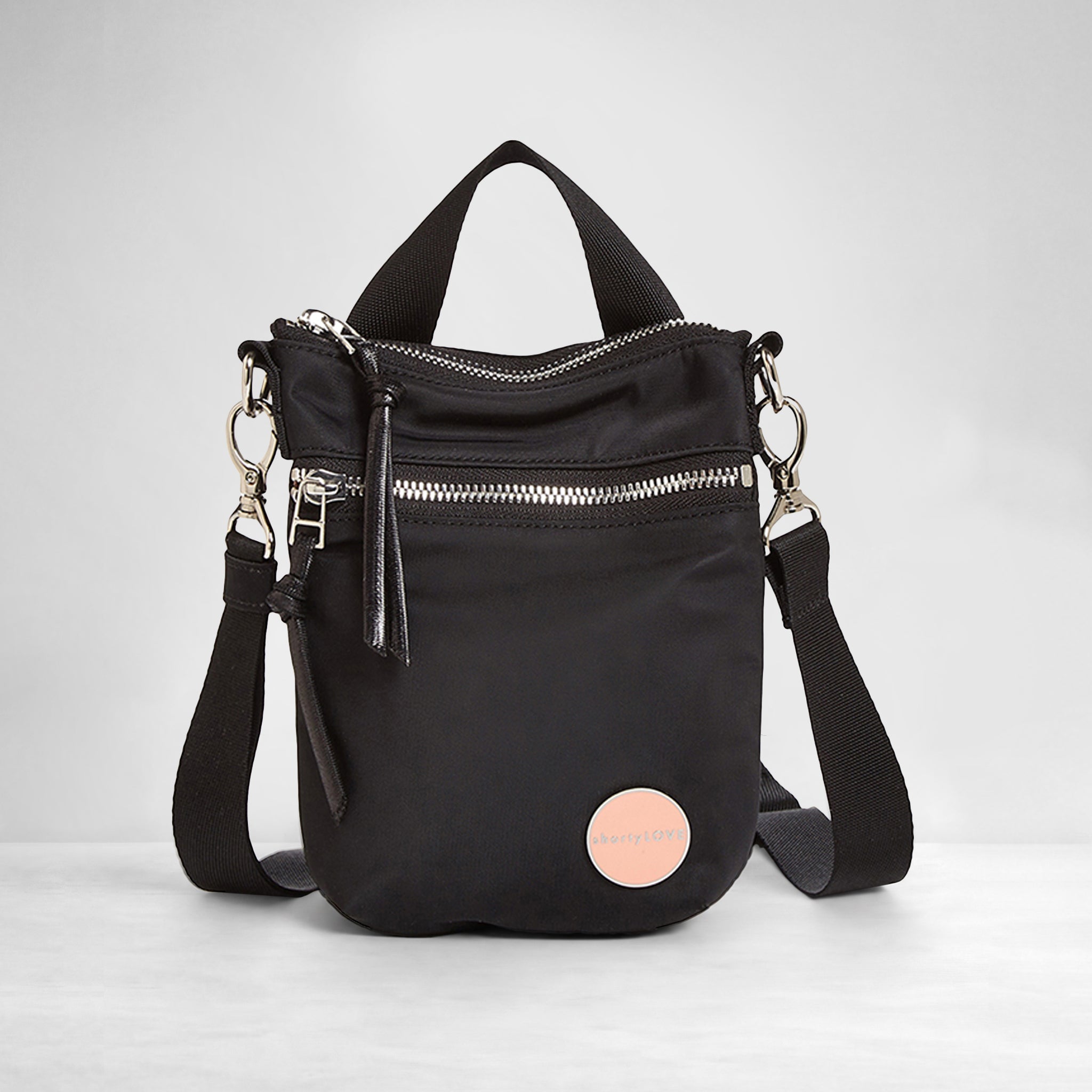 shortyLOVE shorthand women’s designer crossbody handbag in black; front view against white background