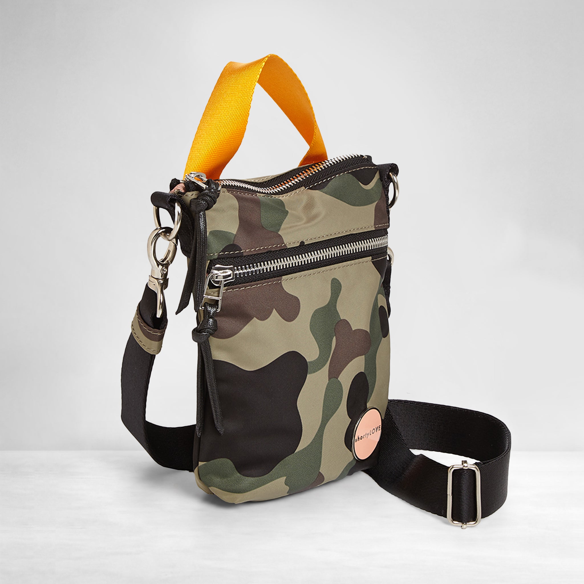 shortyLOVE shorthand crossbody phone bag in green camo; side angle view against white background