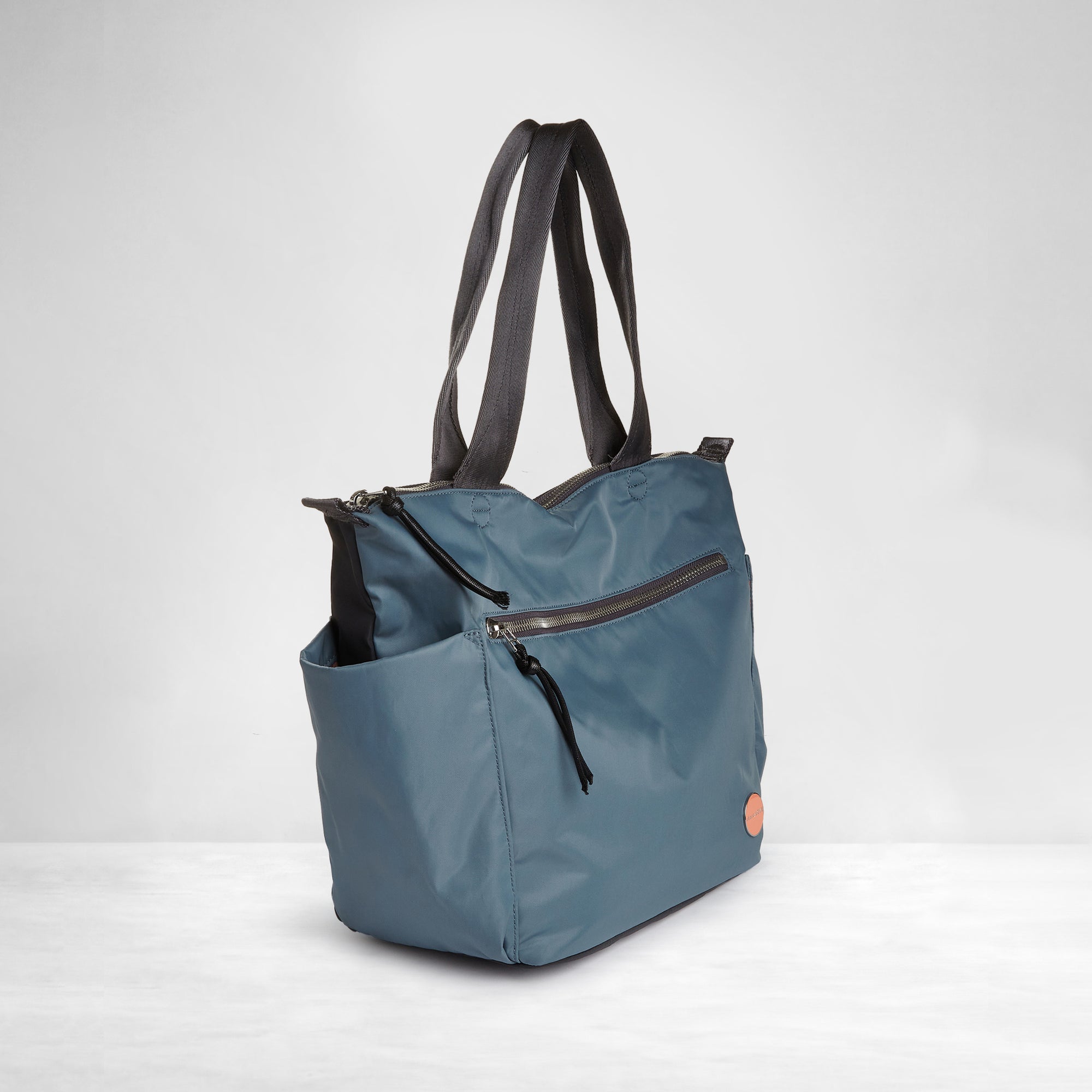 shortyLOVE tillie tote bag in steel blue/charcoal; side view against white background.