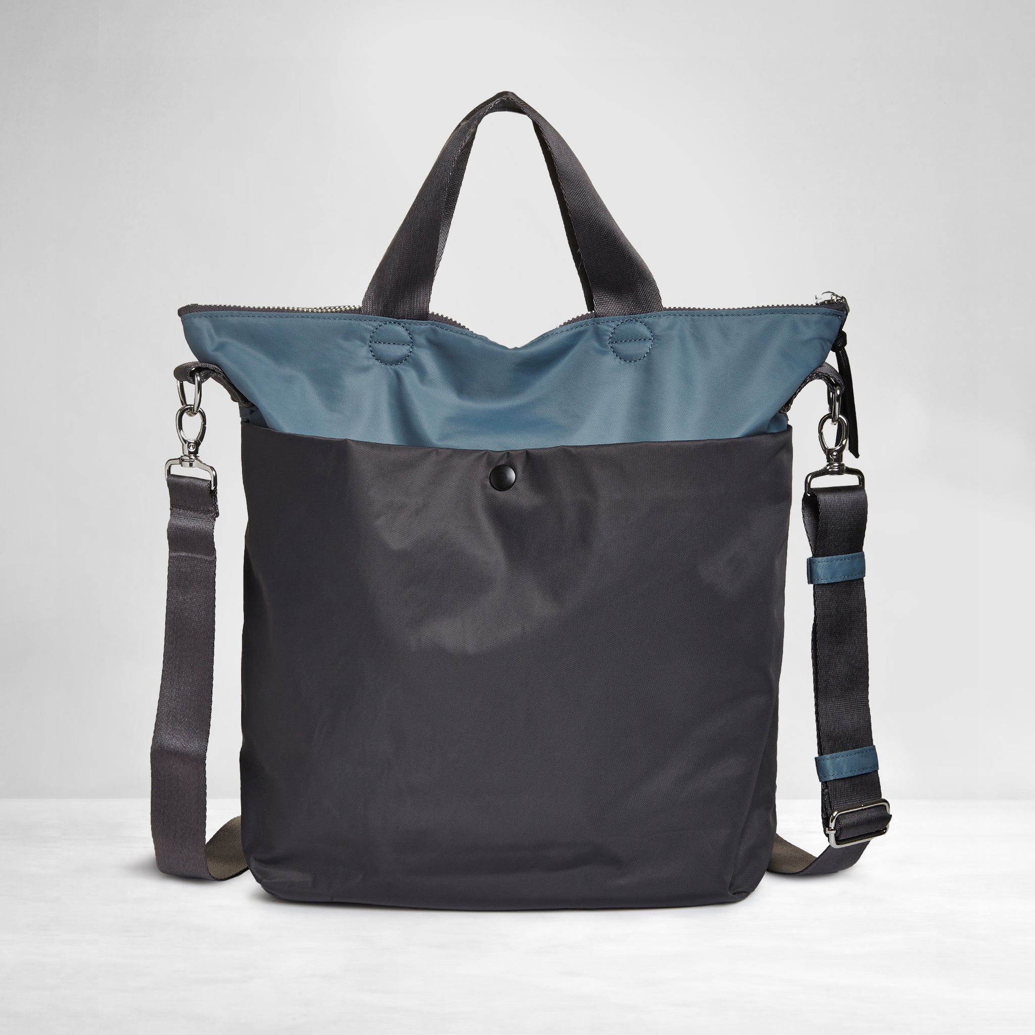 shortyLOVE wonder large crossbody/messenger bag in steel blue/charcoal; back view against white background.