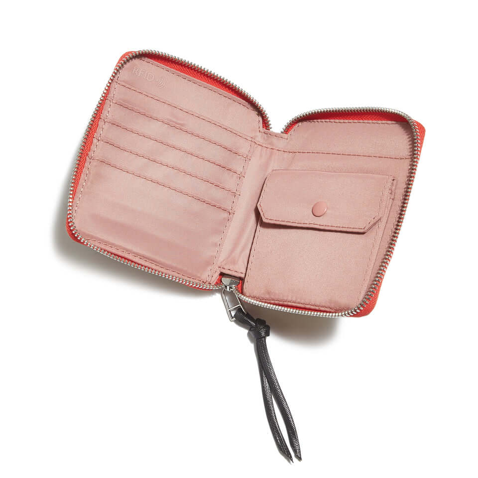shortyLOVE merchant clutch/wallet in khaki; top-down view showing interior pink lining against white background.