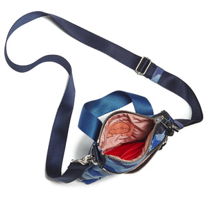 shortyLOVE shorthand small crossbody bag in blue camo; top-down view showing interior blush lining against white background.